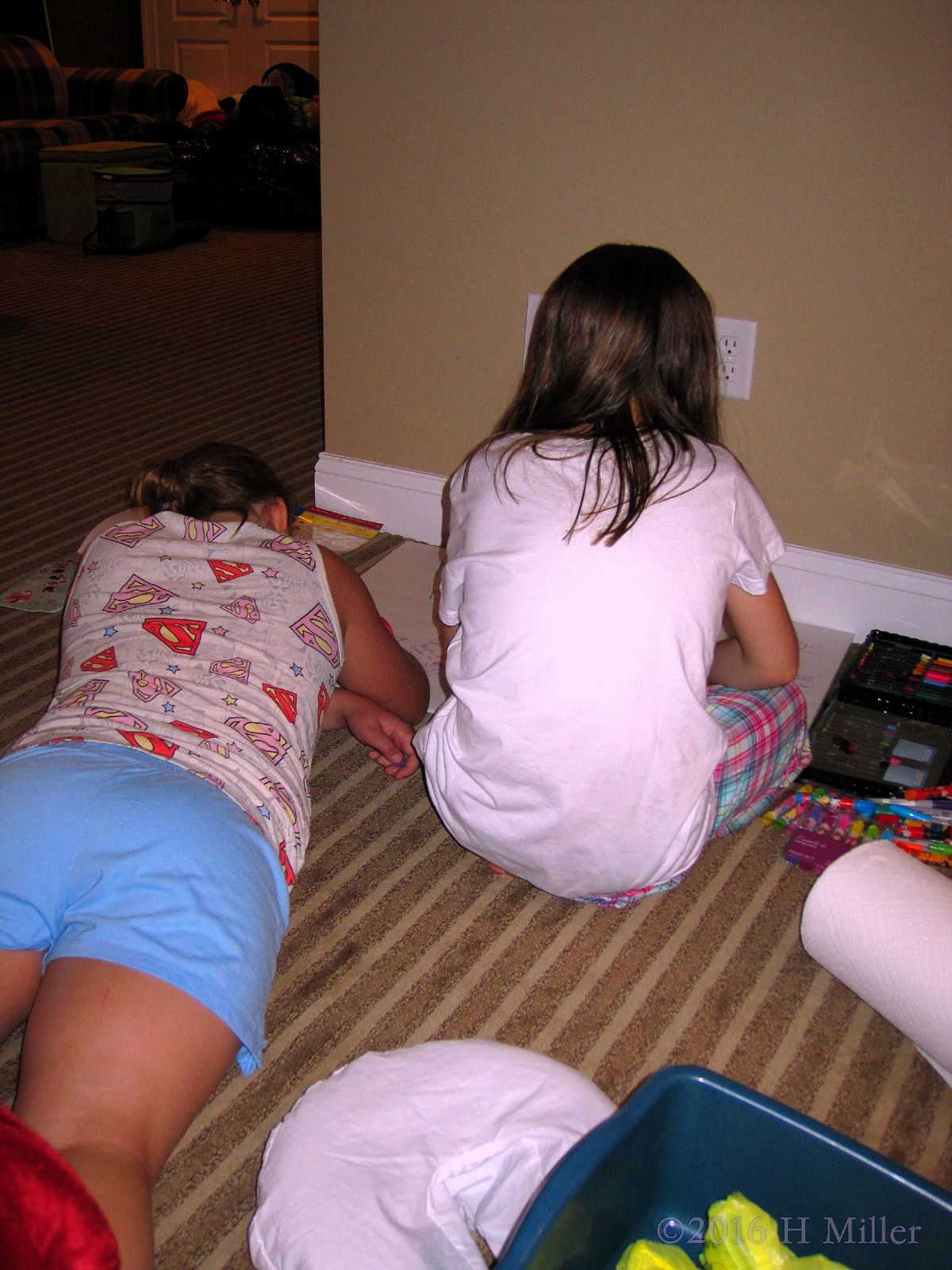 The Girls Work On The Birthday Card. 