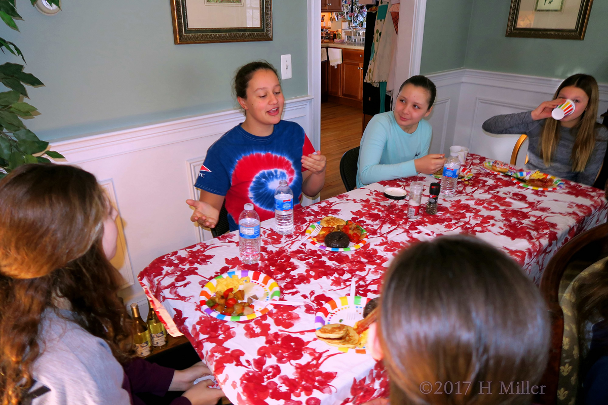 Eating And Chatting At The Birthday Breakfast Table 