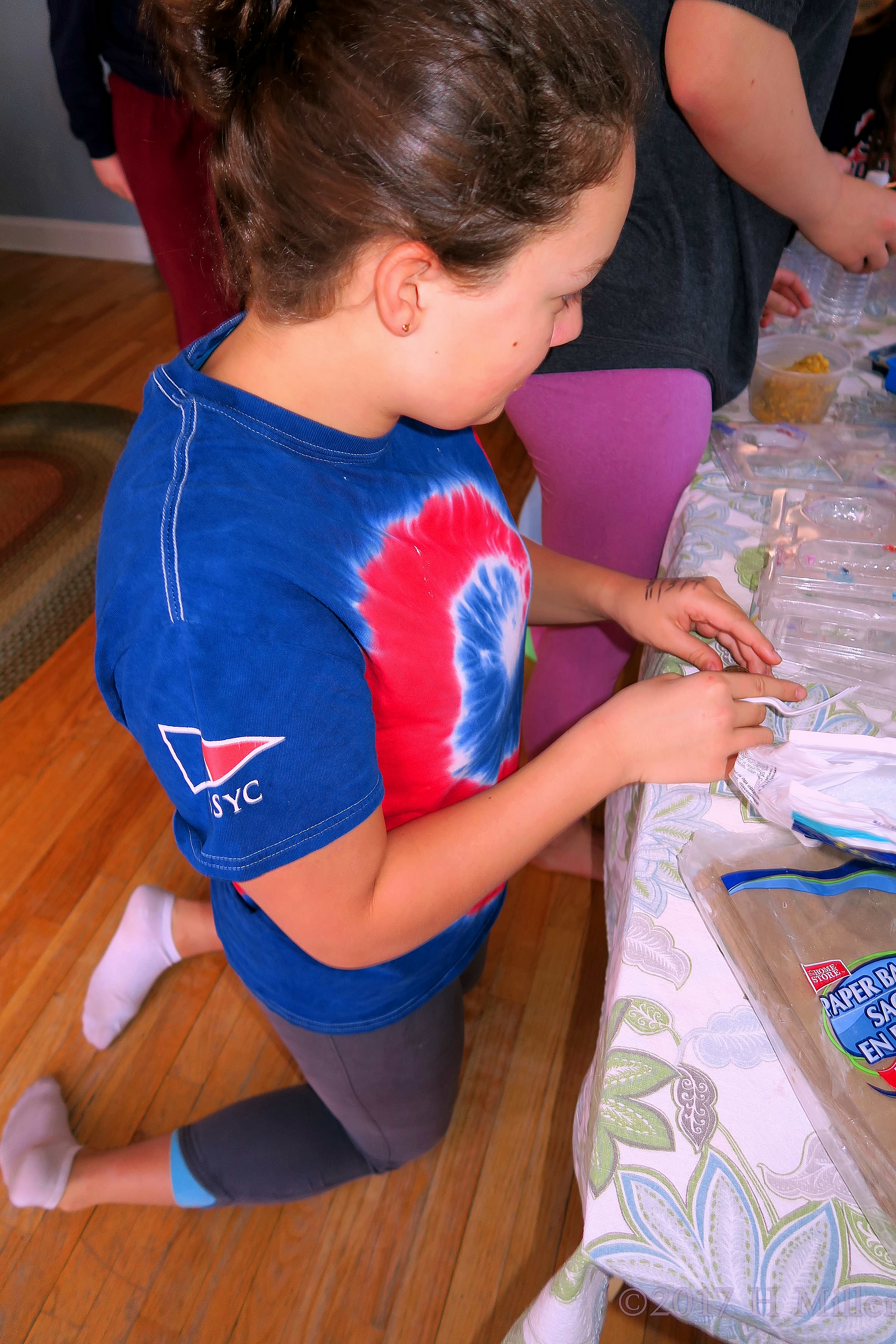 Closer To The Action Kneeling To Work On The Kids Craft Closer To The Action Kneeling To Work On The Kids Craft