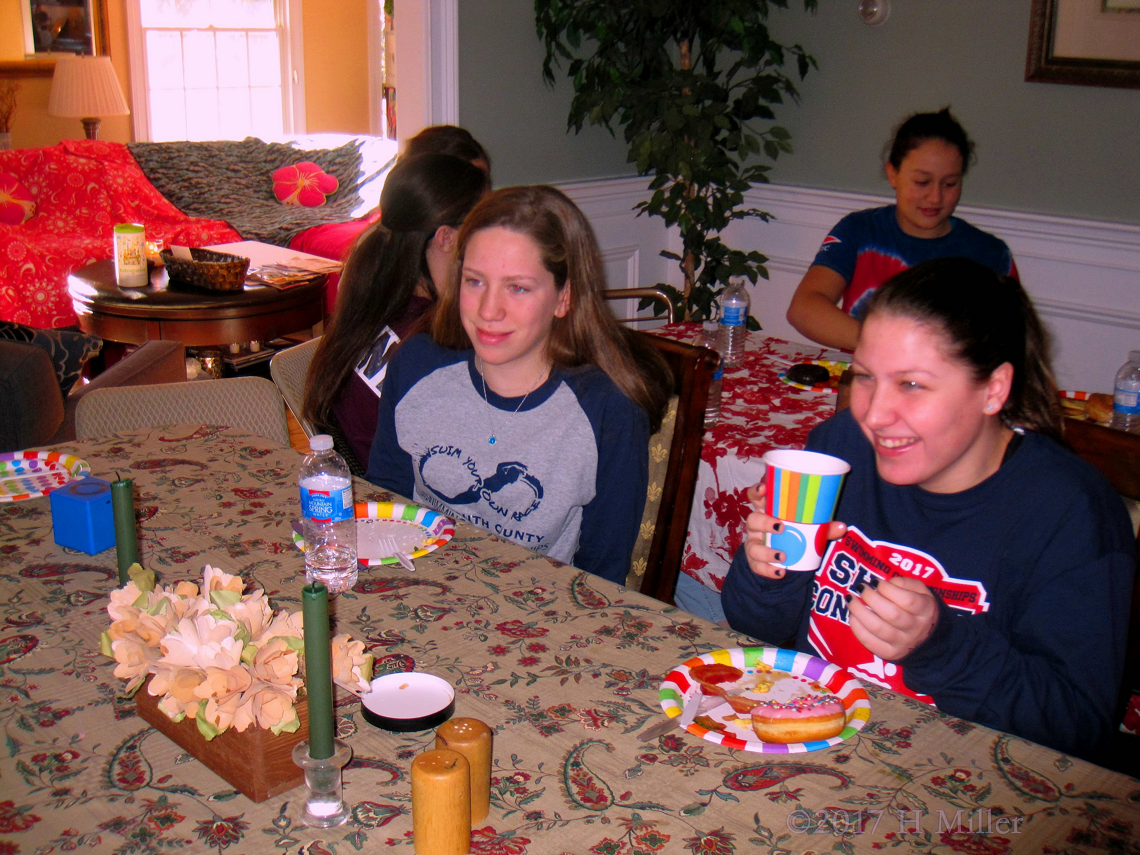 Guests Chatting And Laughing Around The Table Guests Chatting And Laughing Around The Table