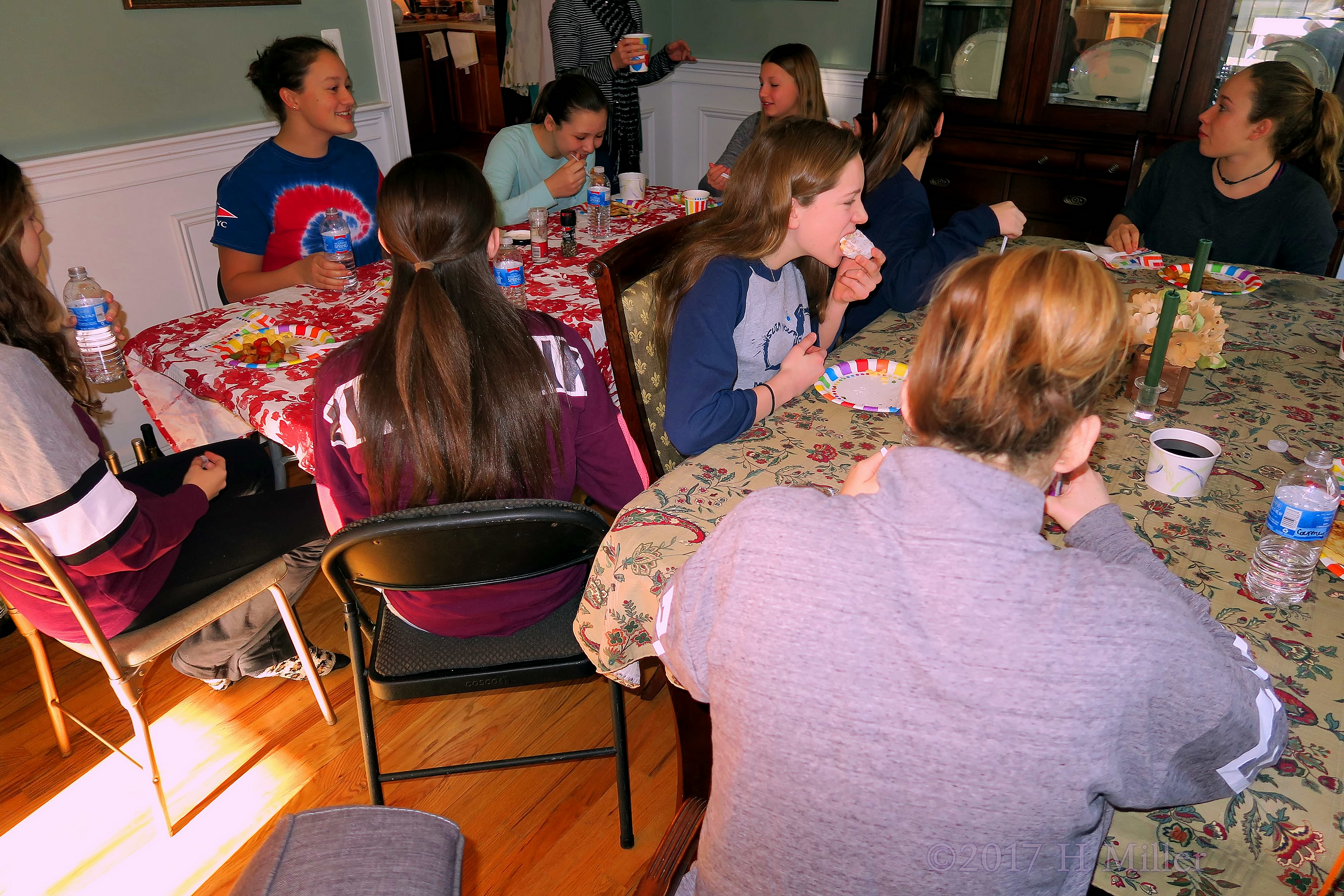 Party Guest Biting Into A Delicious Donut Party Guest Biting Into A Delicious Donut