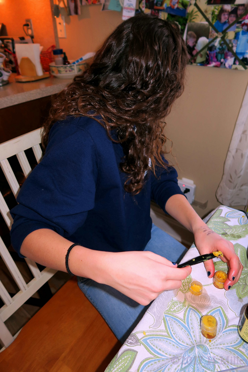 Party Guest Scooping Out Kids Craft Supplies