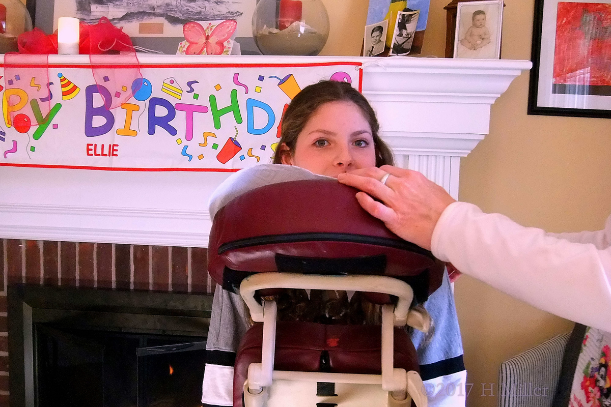 Birthday Banner and Spa Guest Posing In Massage Chair 