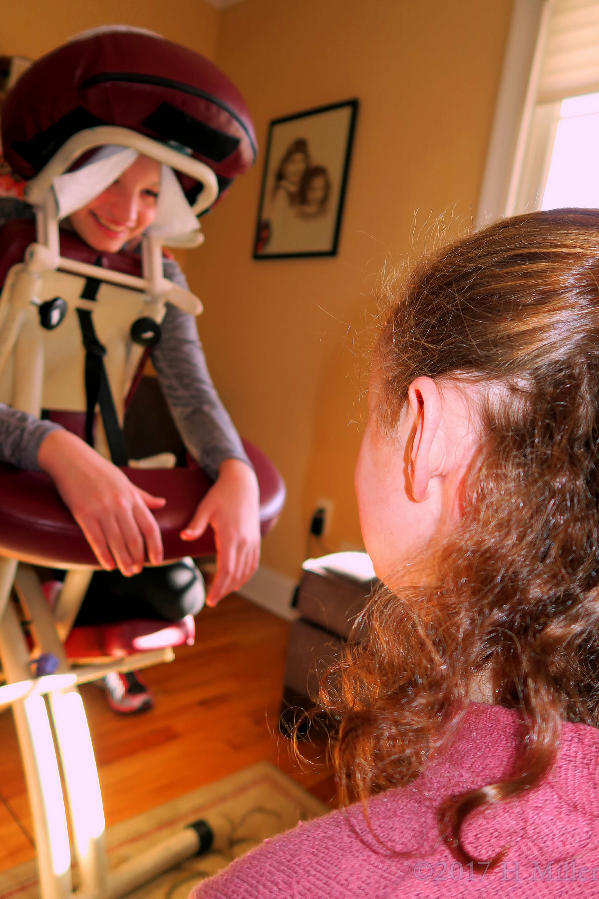 Massages And Good Conversation. Party Guests Hang Out During Chair Massage 