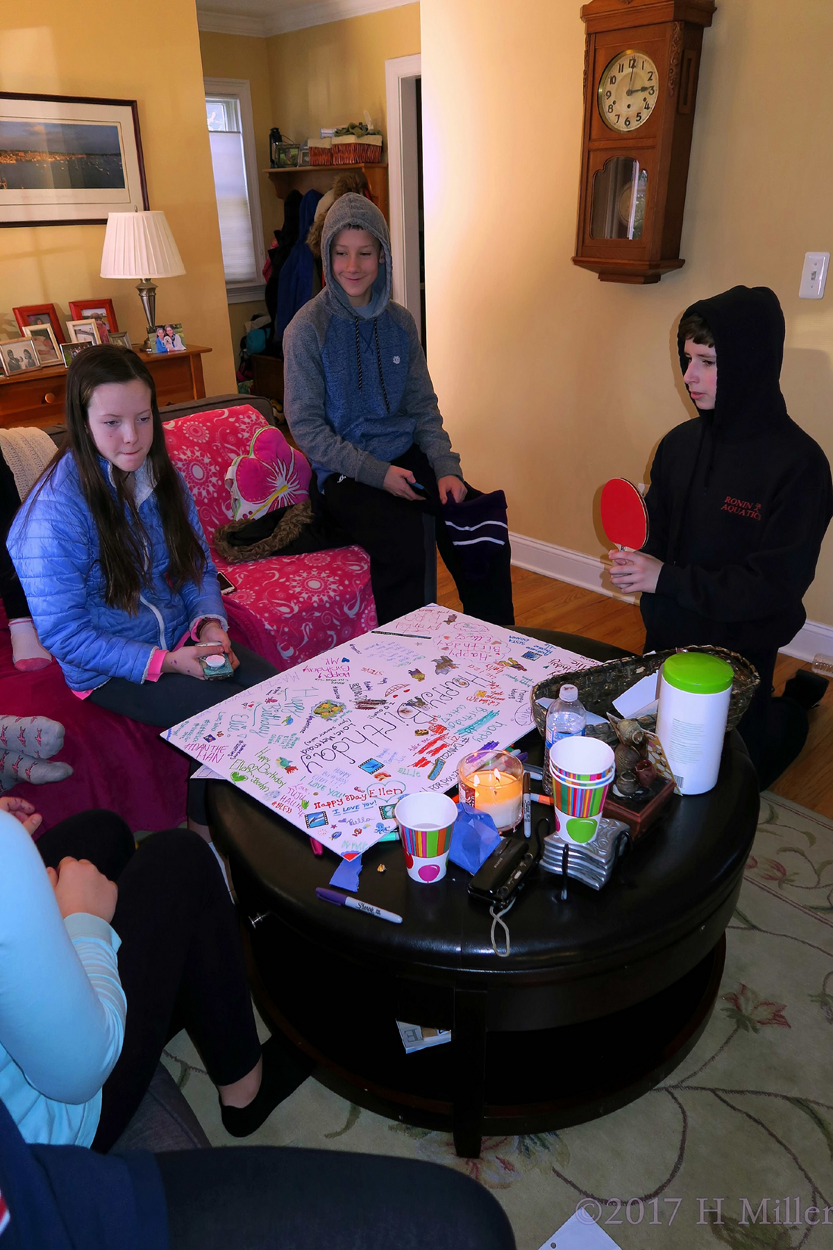 Paddles And Party Guests Signing The Spa Birthday Card During The Girls Spa Party. 