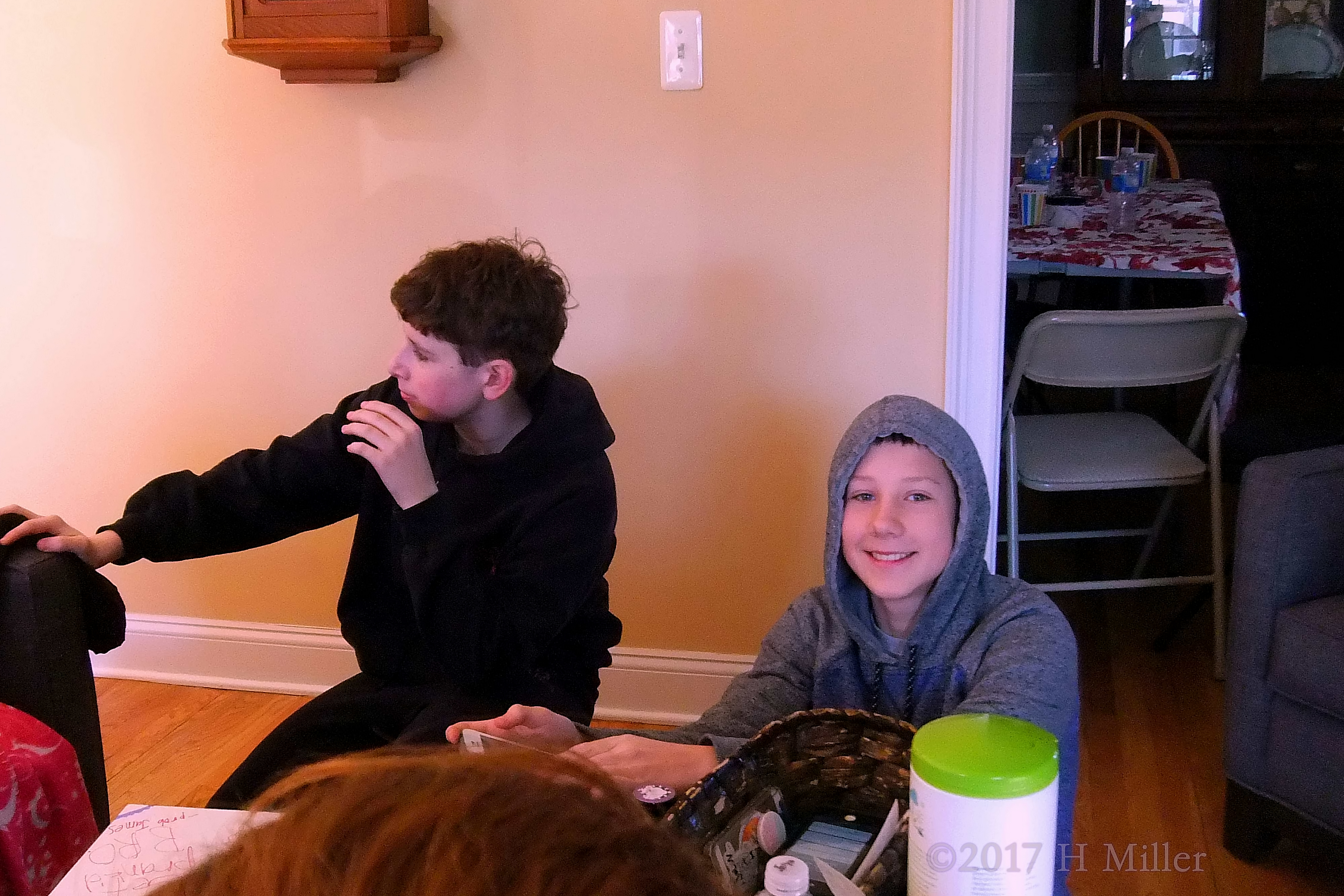 Boys Being Boys. Spa Party Guests Chilling Around The Couch Boys Being Boys. Spa Party Guests Chilling Around The Couch