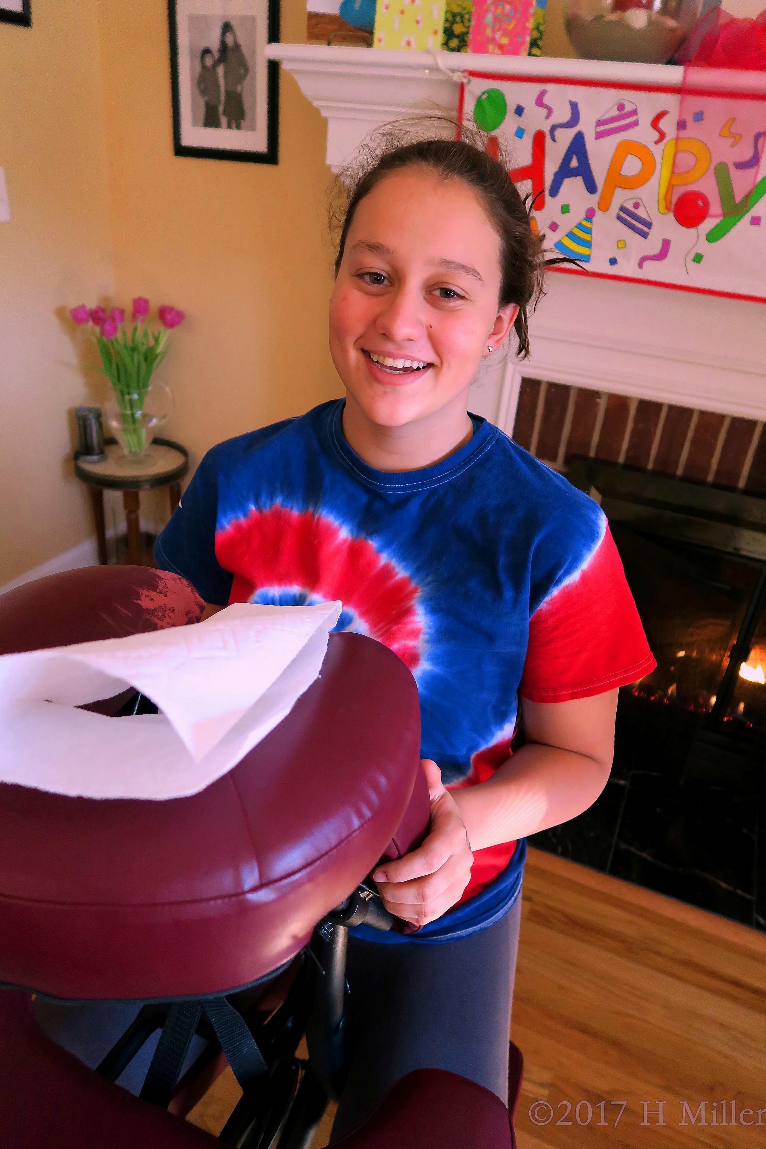 Party Guest Getting Her Turn For Chair Massage. Party Guest Getting Her Turn For Chair Massage.