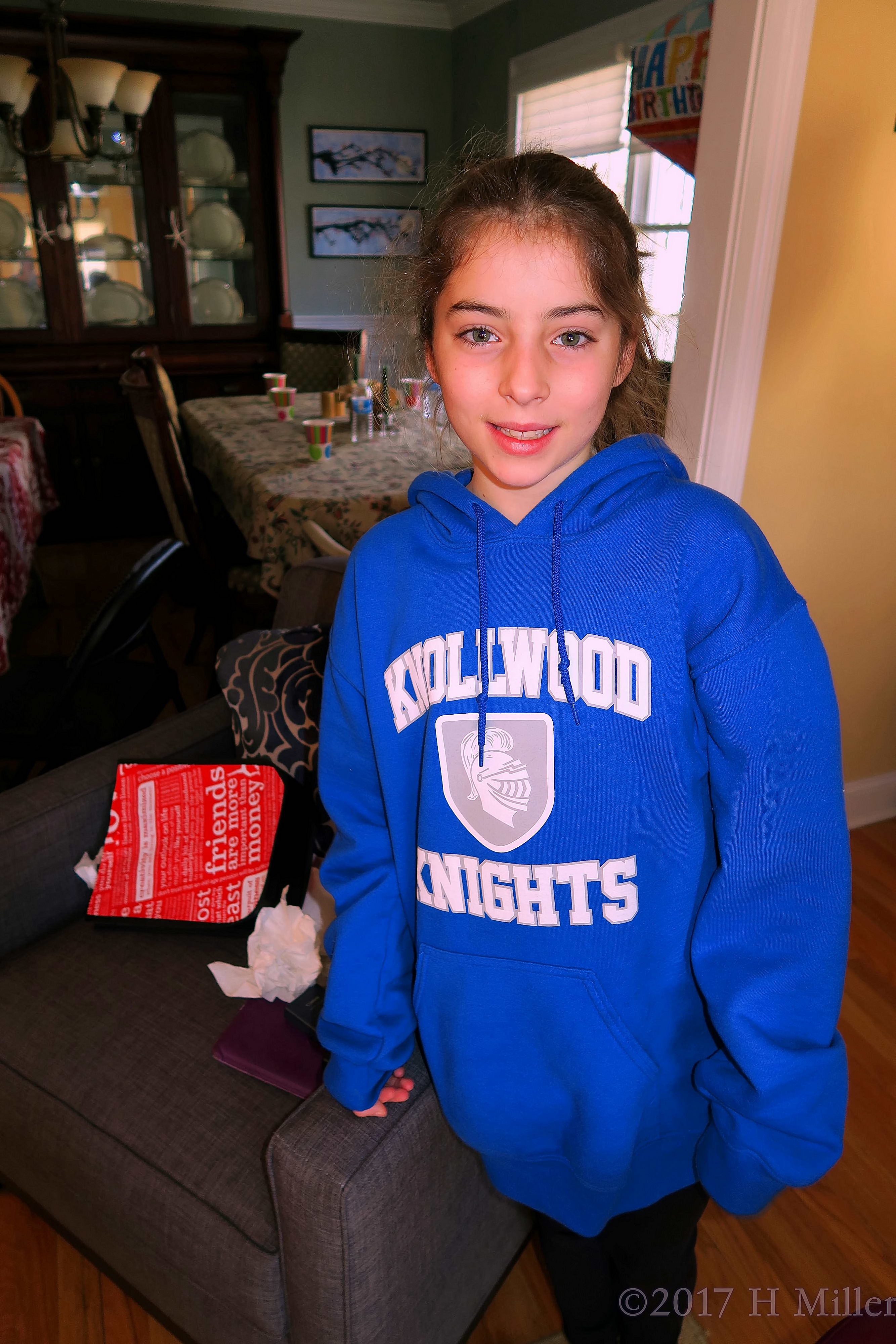Party Guest In Royal Blue Posing During Her Sister's Spa Party. Party Guest In Royal Blue Posing During Her Sister's Spa Party.