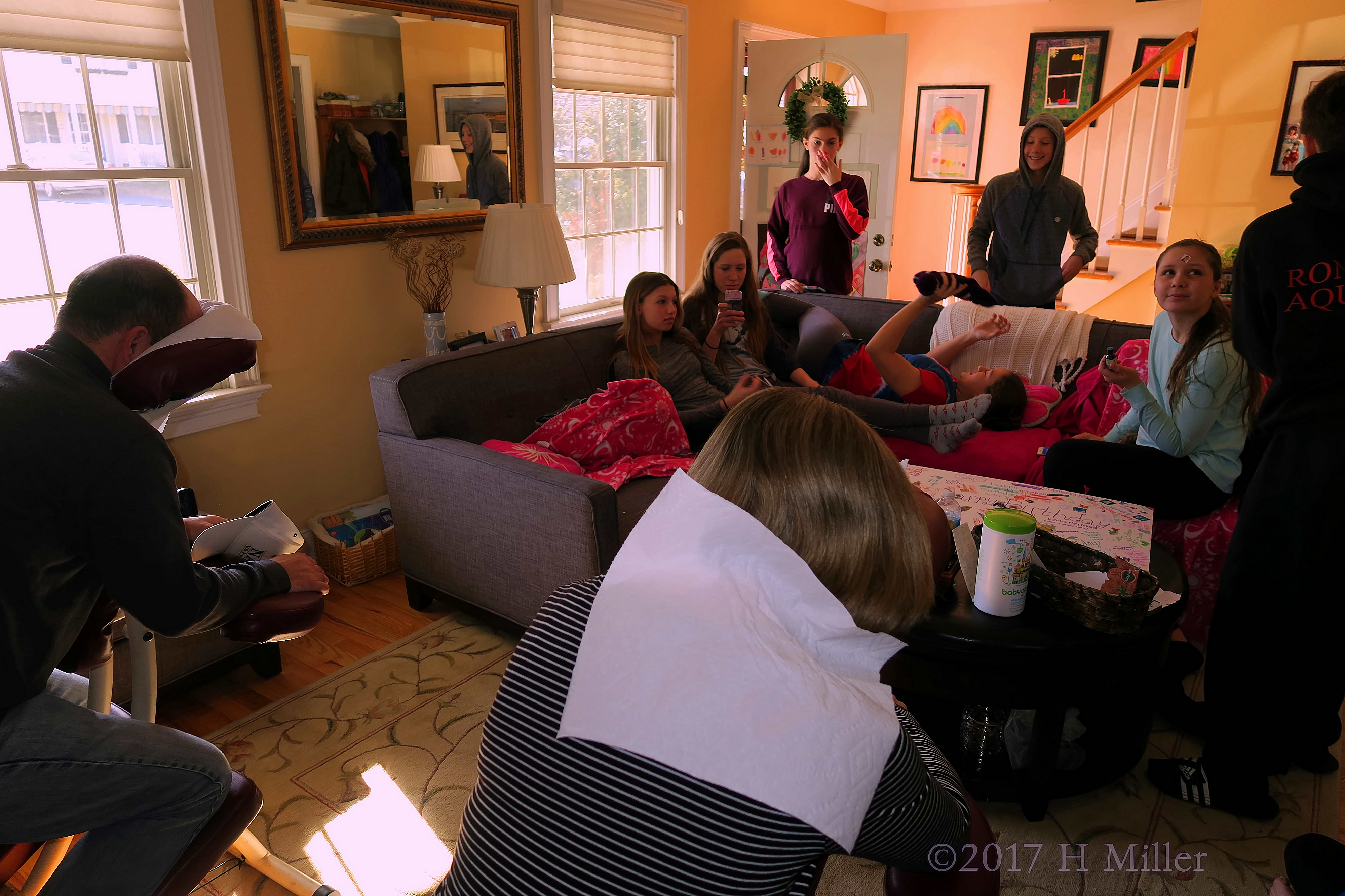 Party Guests Chill On The Couch While Parent Get Chair Massage! 
