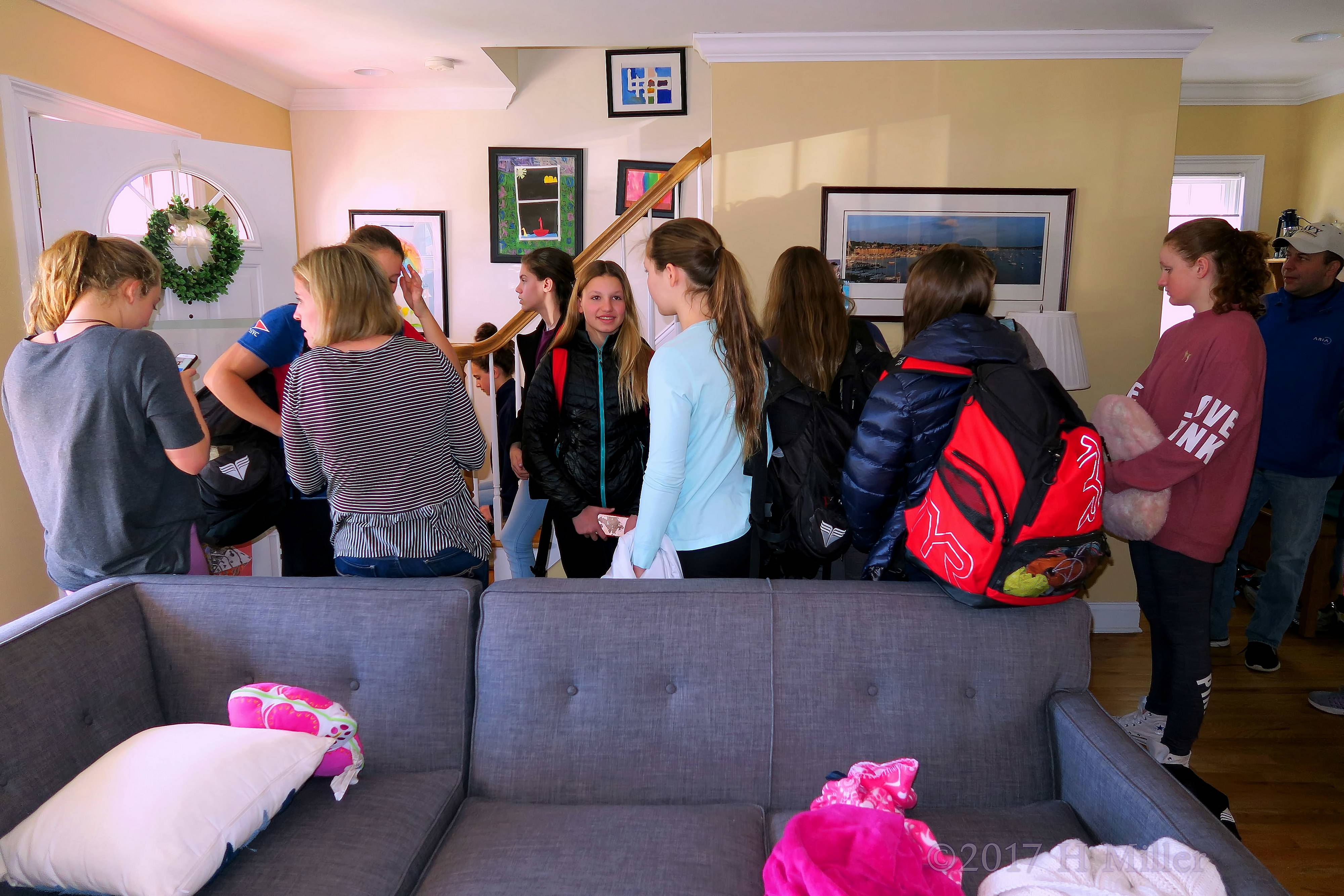 Party Guests Packed Up With Backpacks, Ready To Leave For Their Game. 