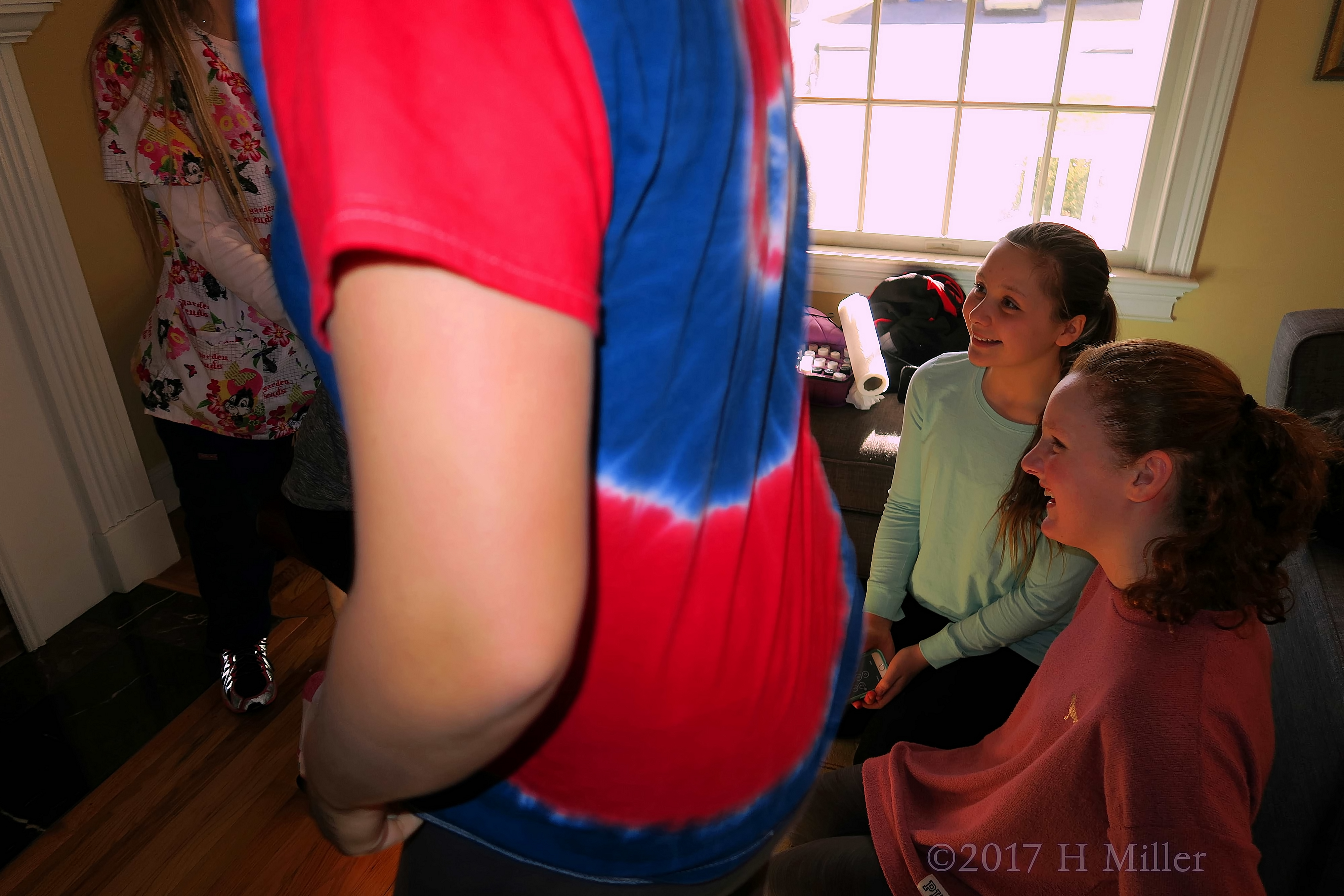 Party Guests Taking Turns For Chair Massages