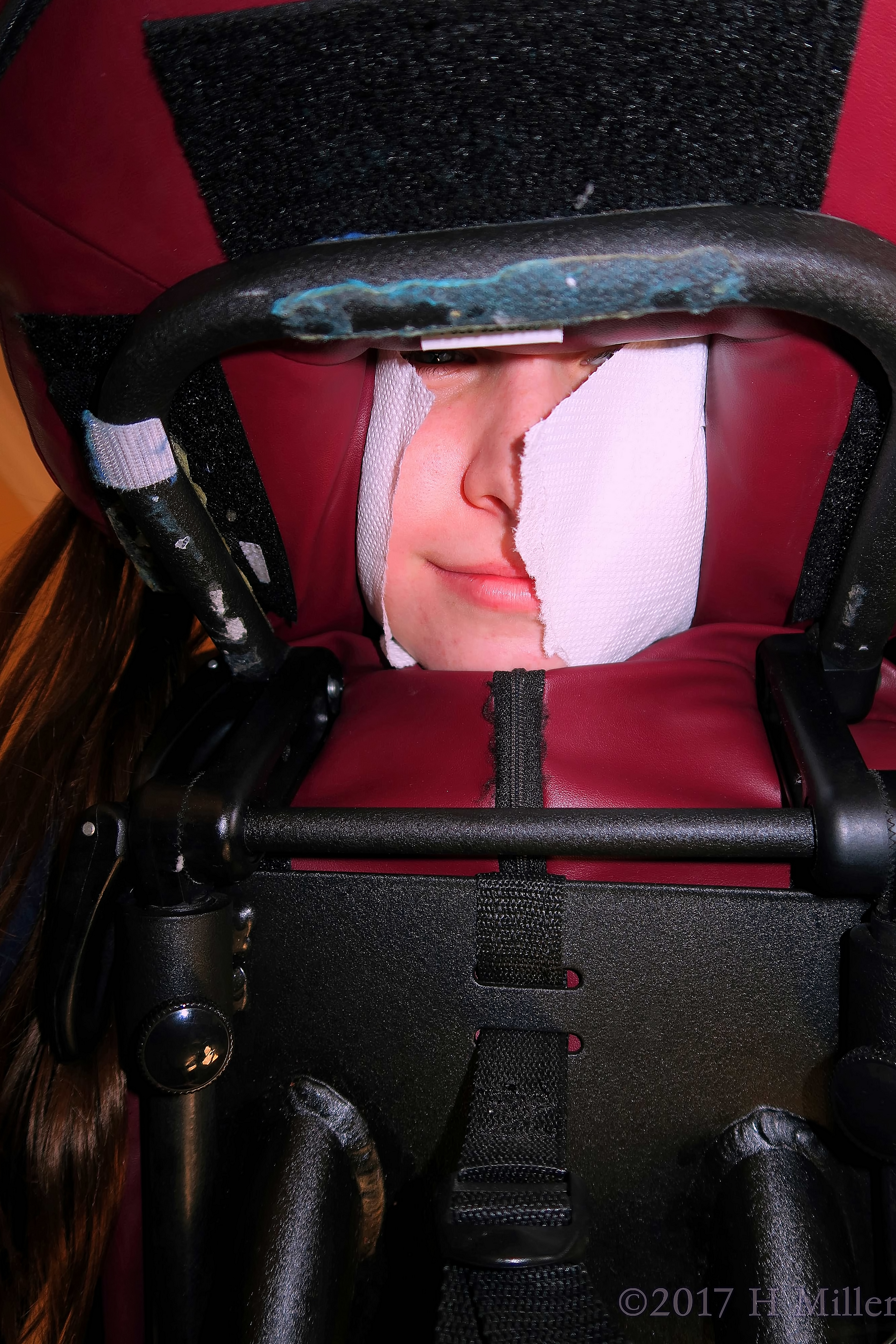 Through The Looking Space Of The Massage Chair. This Party Guest Is Enjoying Her Chair Massage