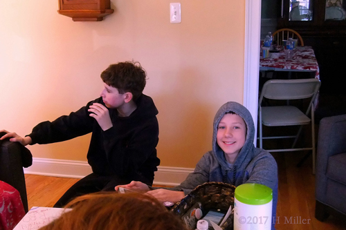 Boys Being Boys. Spa Party Guests Chilling Around The Couch Boys Being Boys. Spa Party Guests Chilling Around The Couch