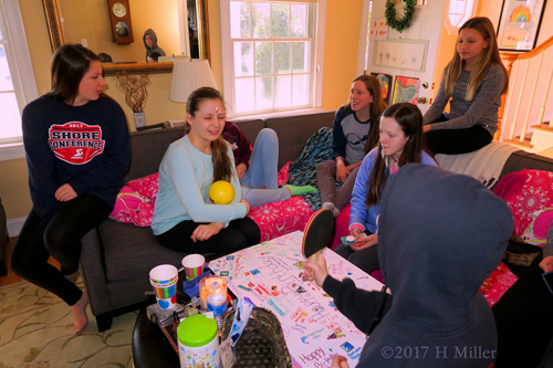 Party Guests Stickering Spa Birthday Card And Each Other!