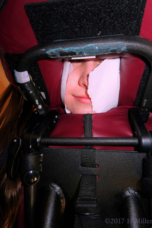 Through The Looking Space Of The Massage Chair. This Party Guest Is Enjoying Her Chair Massag