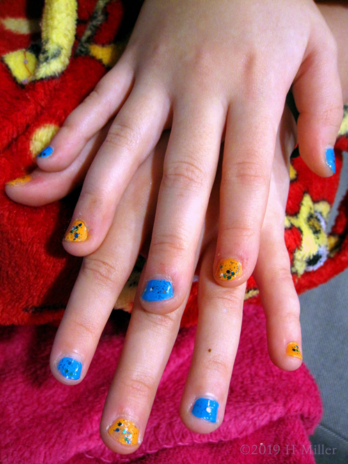 Kids Manicure Blue With Silver Glitter And Yellow With Stars And Glitte