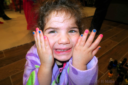 Modeling Her Colorful Girls Manicure