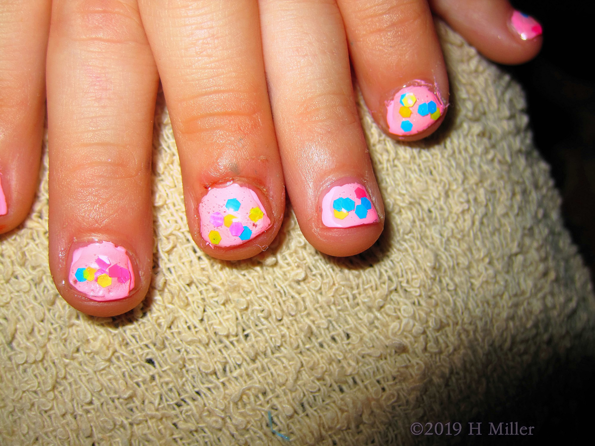 Pink And Polka Dot Polish For This Party Guest's Kids Manicure! 