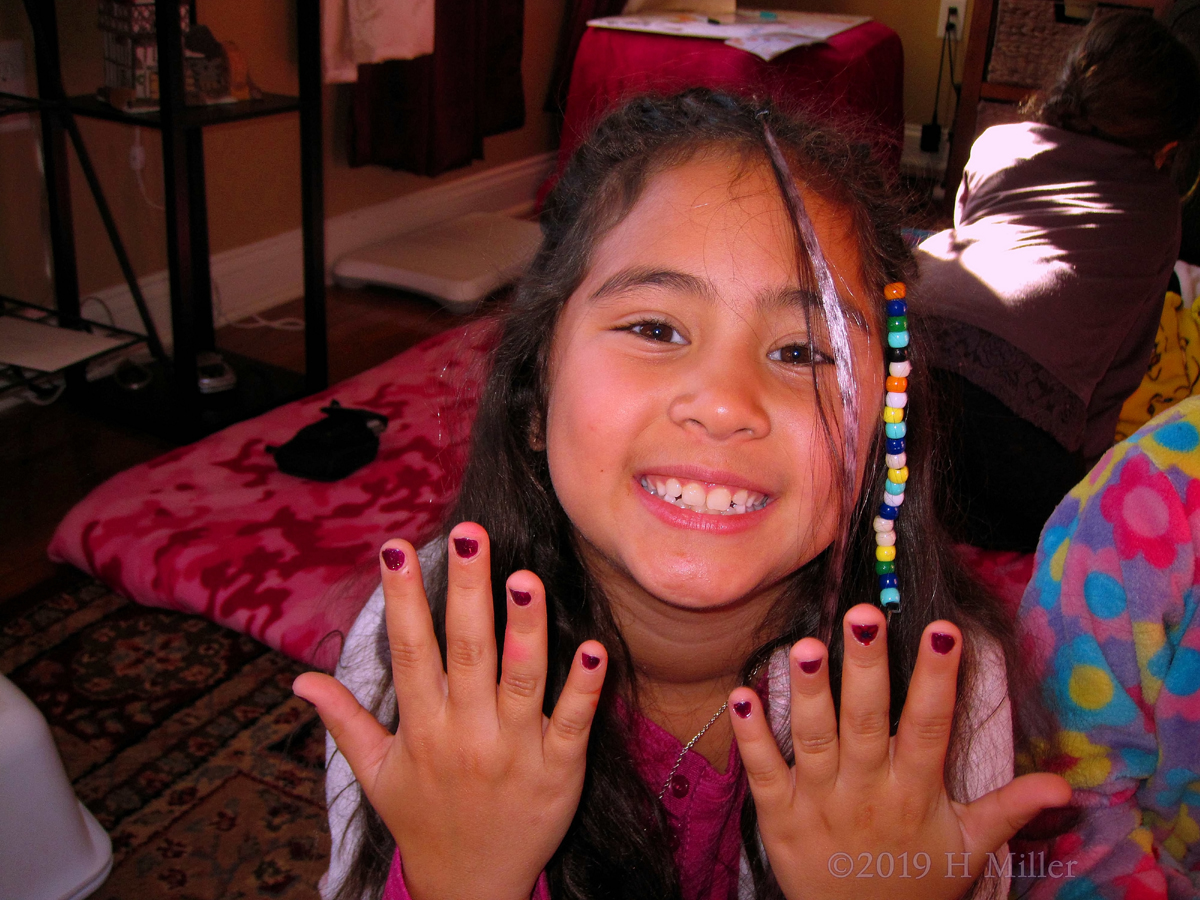 Posing In Purple! Kids Party Guest Shows Off Her Kids Manicure! 