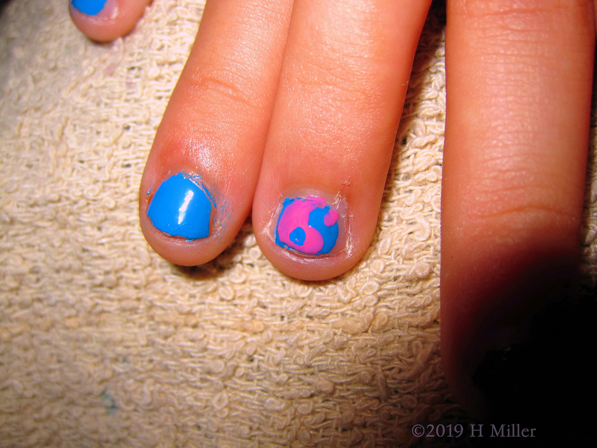 Pretty In Pink! Polished With Blue Polish And Pink Yin Yang Nail Design On Kids Mani! 