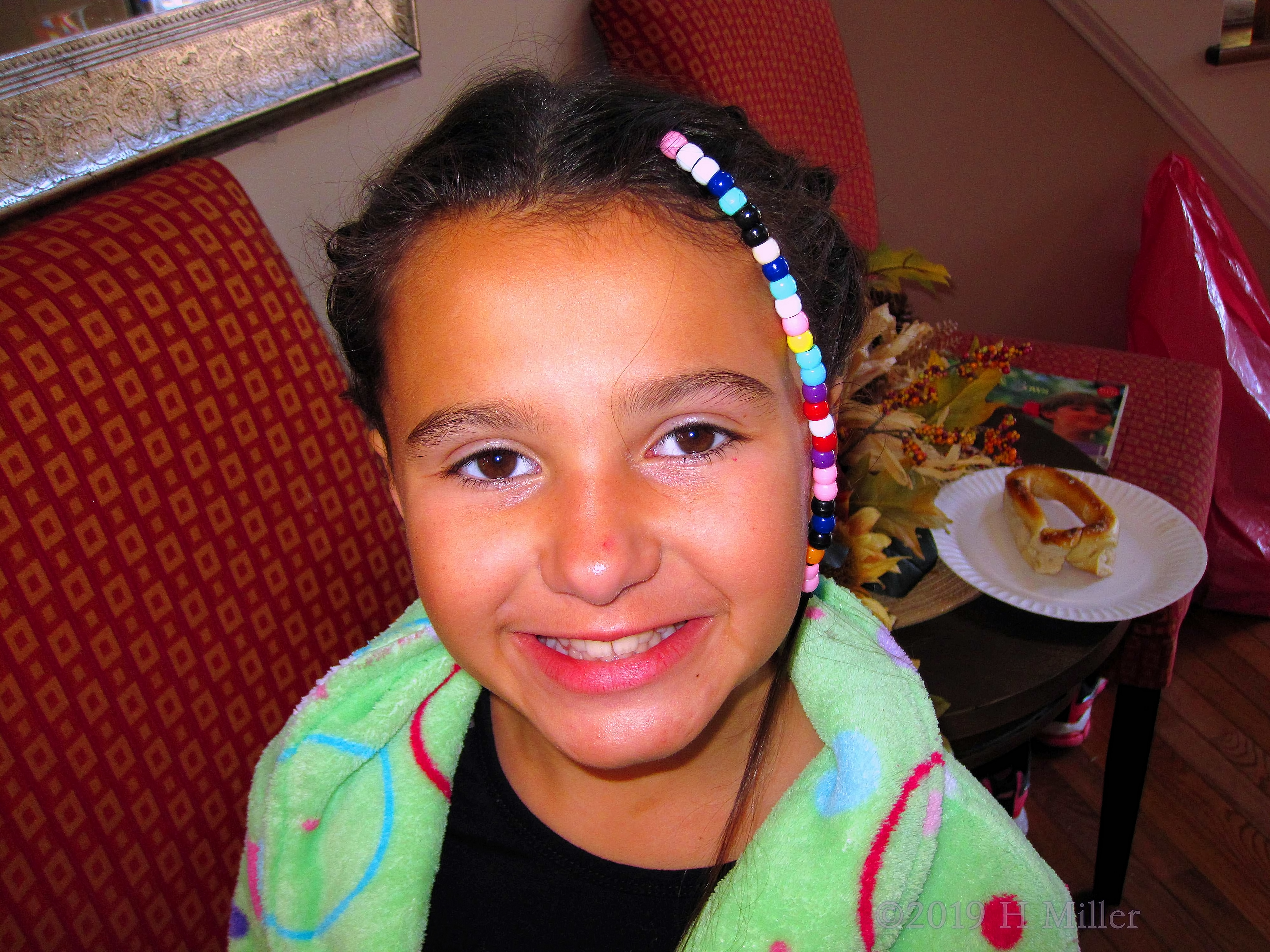 Beaming In Beads! Party Guest Shows Off Kids Hairstyle With Beads! 