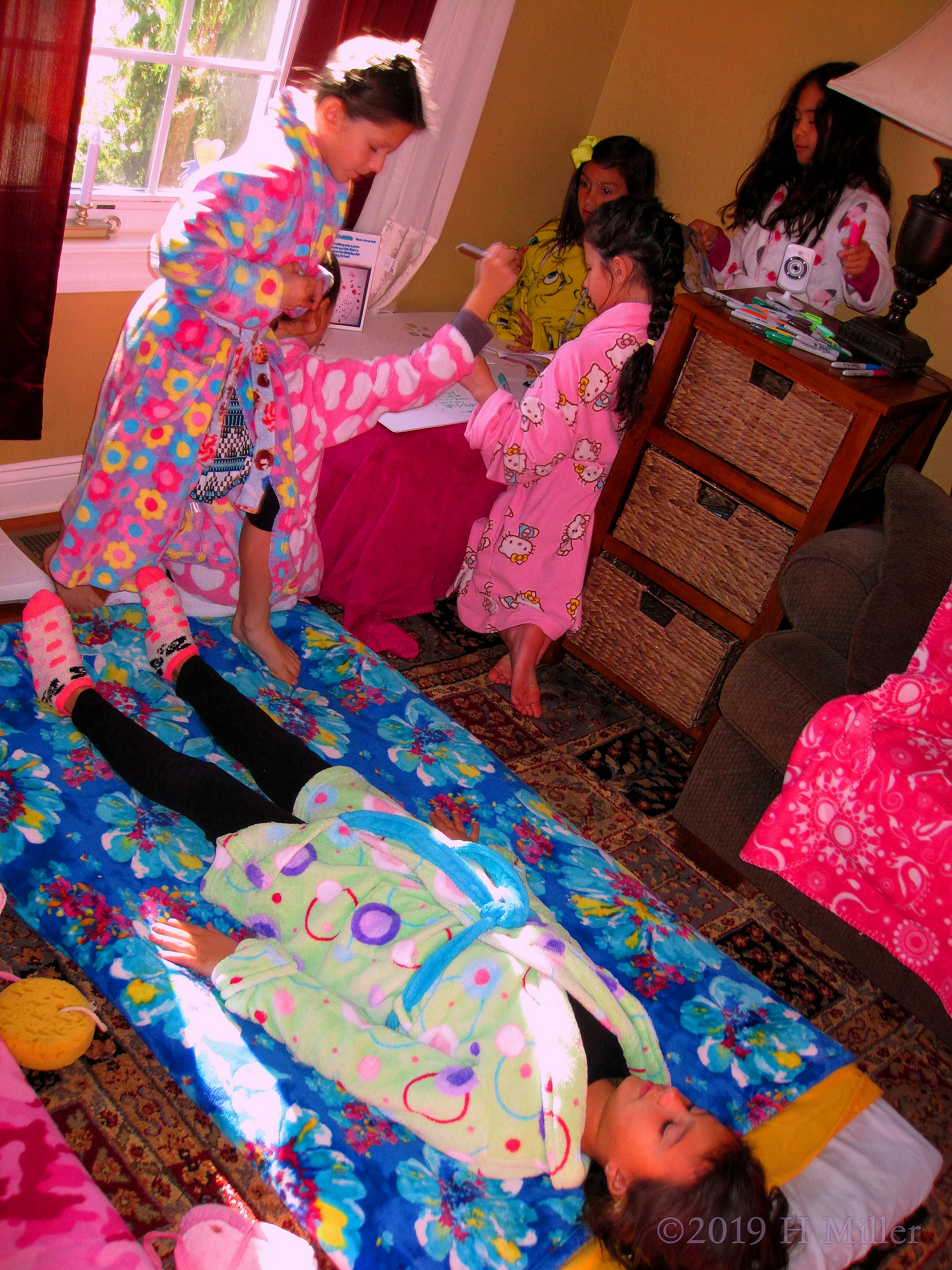 Laying Down Lounging! Spa Party Guests Sign Spa Birthday Card While Their Friend Waits For Her Kids Facial! Laying Down Lounging! Spa Party Guests Sign Spa Birthday Card While Their Friend Waits For Her Kids Facial!