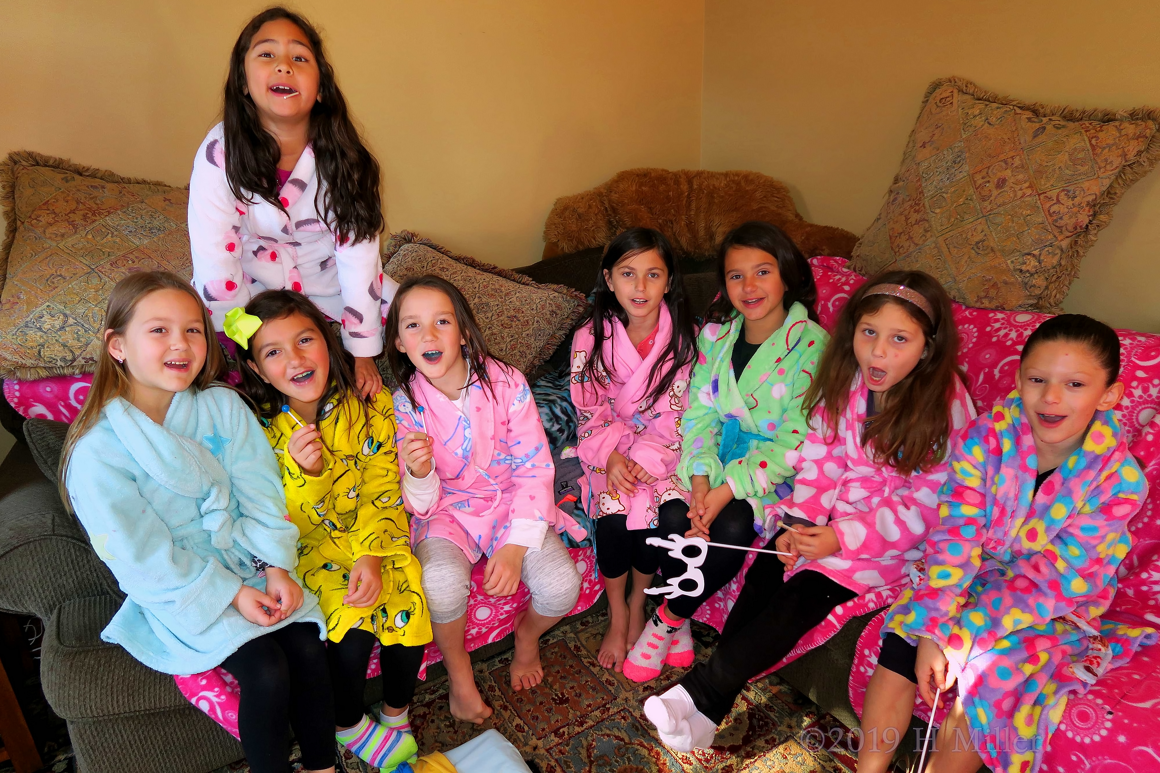 Pretty Comfy For The Party! Party Guests Pose For The Group Photo In Spa Robes! Pretty Comfy For The Party! Party Guests Pose For The Group Photo In Spa Robes!