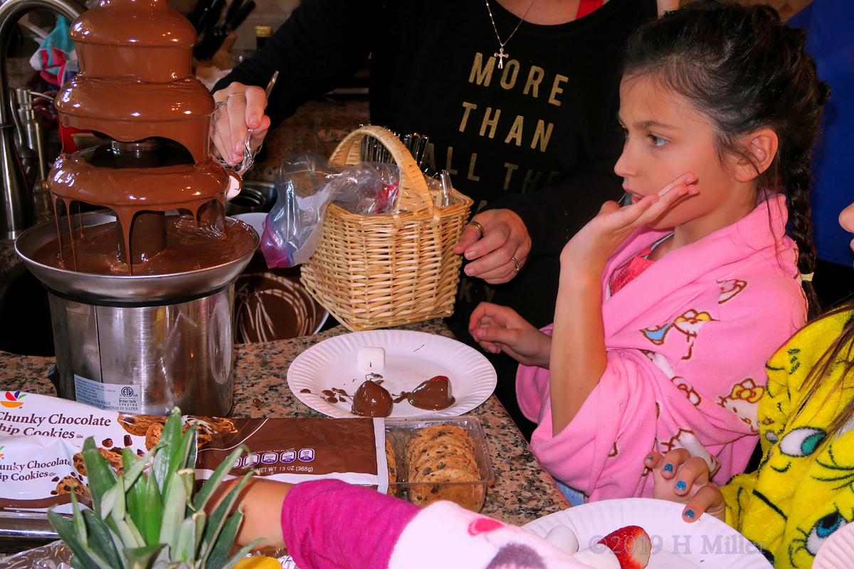 Covered In Chocolate! Party Guest Enjoys Chocolate Fountain! 