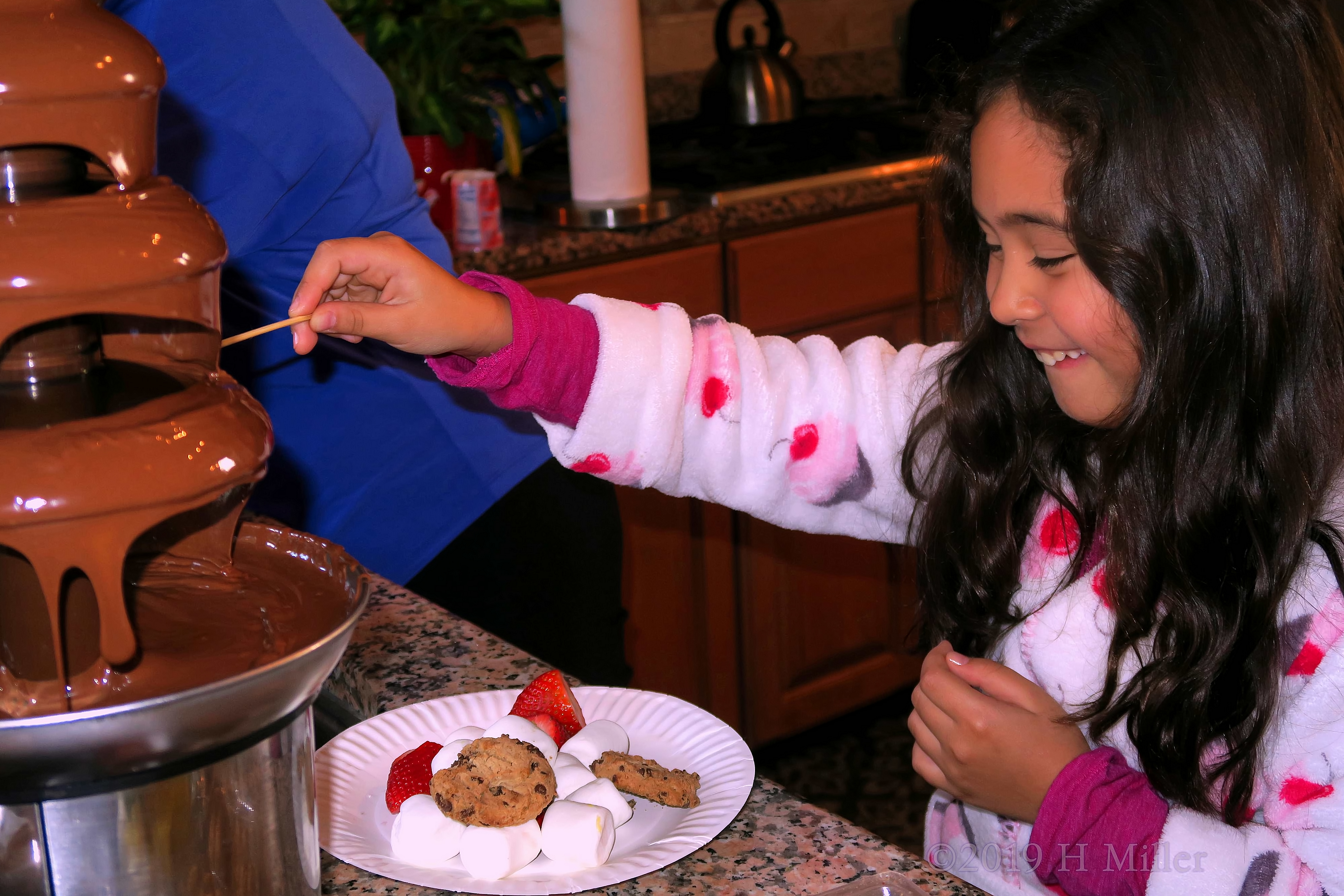Dipping In! Party Guests Use Chocolate Fountain! Dipping In! Party Guests Use Chocolate Fountain!