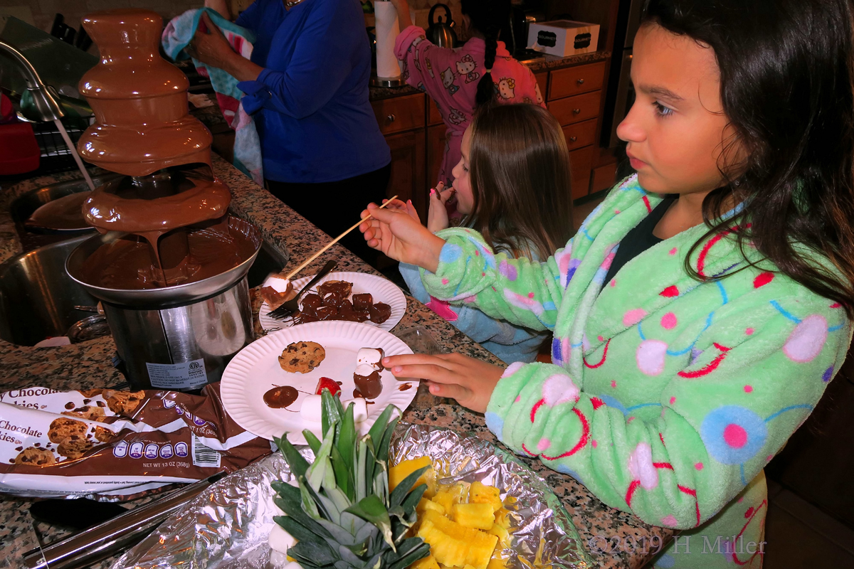 Fruit And Fondue! Party Guest Uses Chocolate Fountain! Fruit And Fondue! Party Guest Uses Chocolate Fountain!