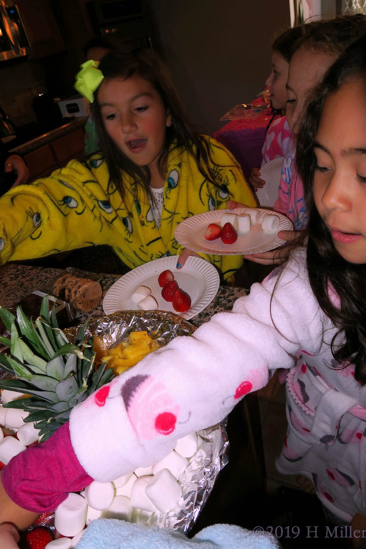 Pictures And Plates! Party Guests Grab Snacks For The Chocolate Fountain! Pictures And Plates! Party Guests Grab Snacks For The Chocolate Fountain!