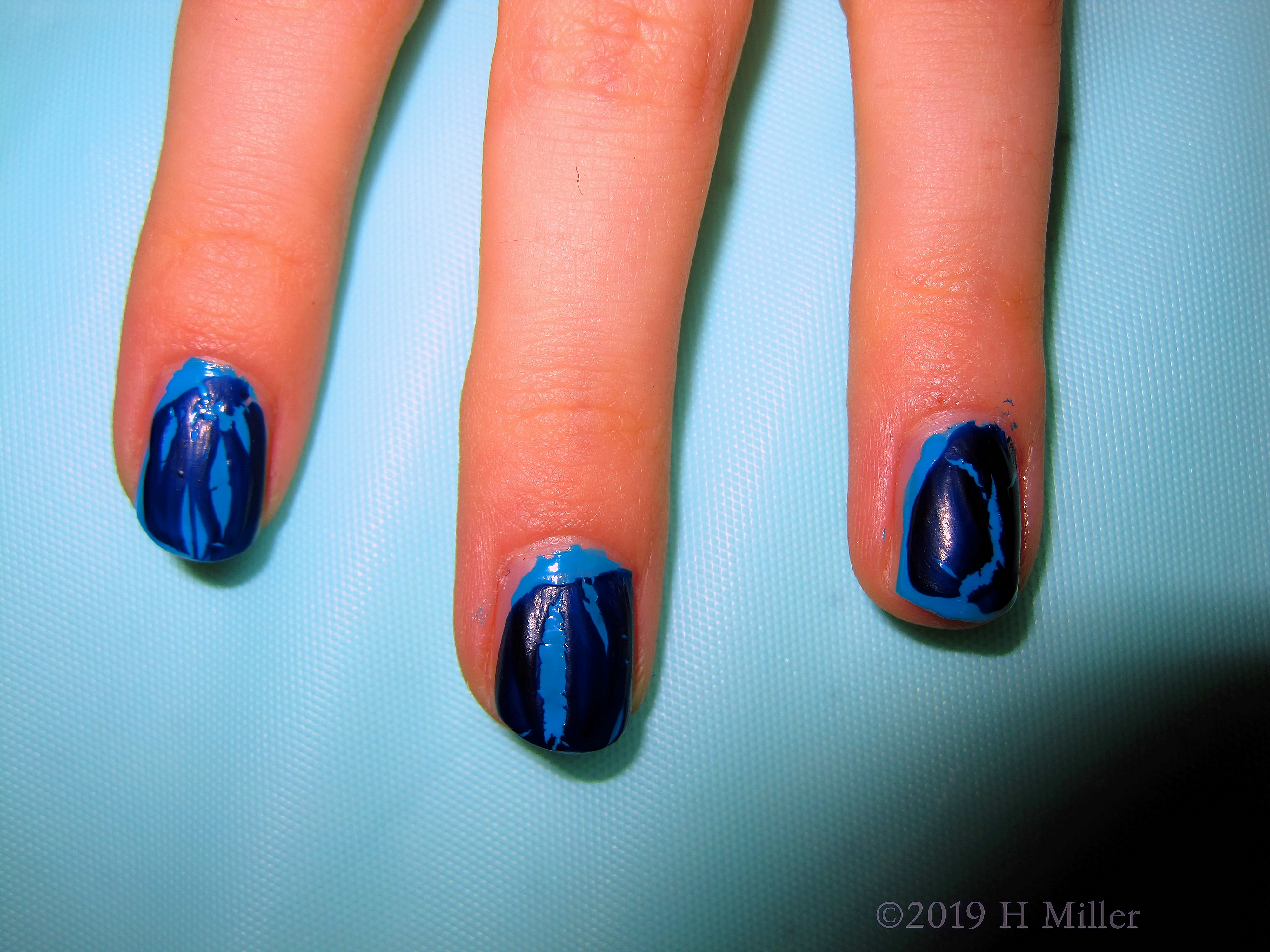 Bedazzled In Blue! Party Guest Shows Off Marbled Blue Nail Polish For Kids Mani! Bedazzled In Blue! Party Guest Shows Off Marbled Blue Nail Polish For Kids Mani!