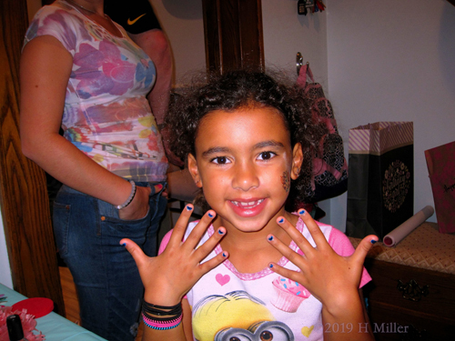 Blue Beaming! Party Guest Poses With Her Kids Manicure!