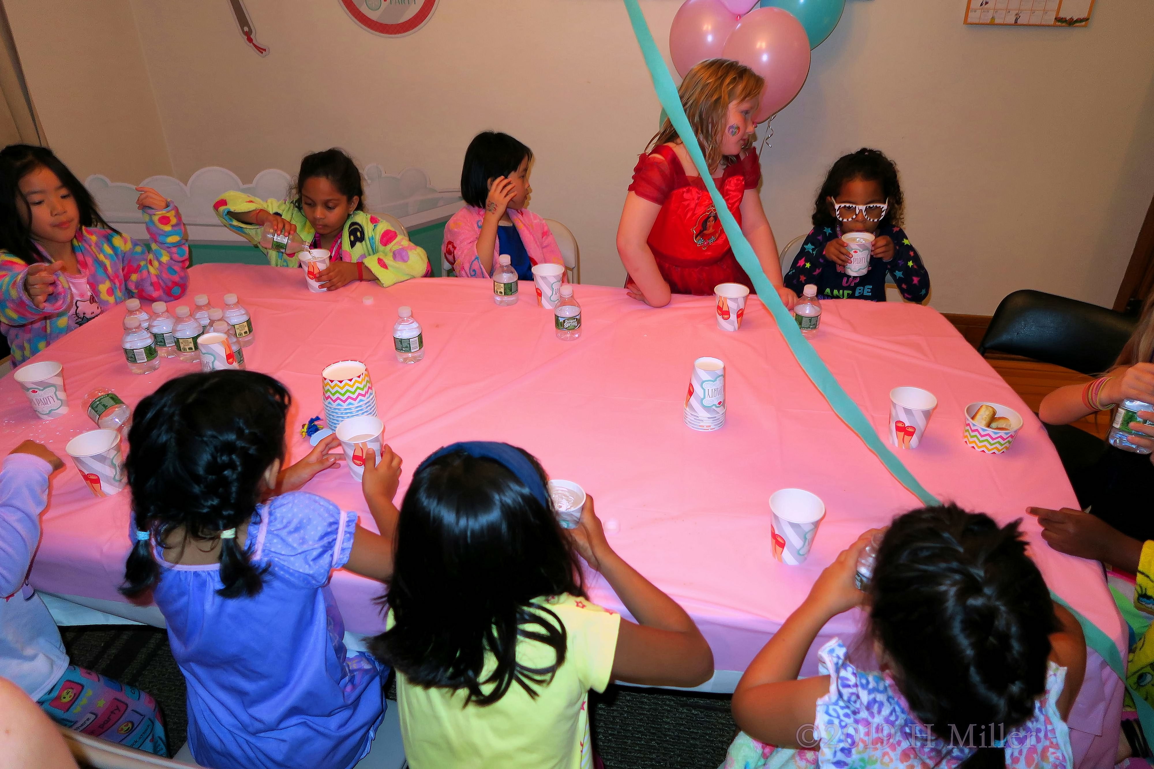 Gathered Around! Party Guests Around Spa Party Table! Gathered Around! Party Guests Around Spa Party Table!