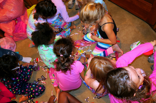 Finders Keepers! Party Guests Pick Up Goodies From The Pinata! Finders Keepers! Party Guests Pick Up Goodies From The Pinata!