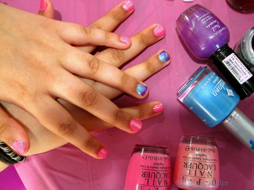Beautiful Pink Girls Manicure Along With An Ombre Nail Design Of Purple And Blu
