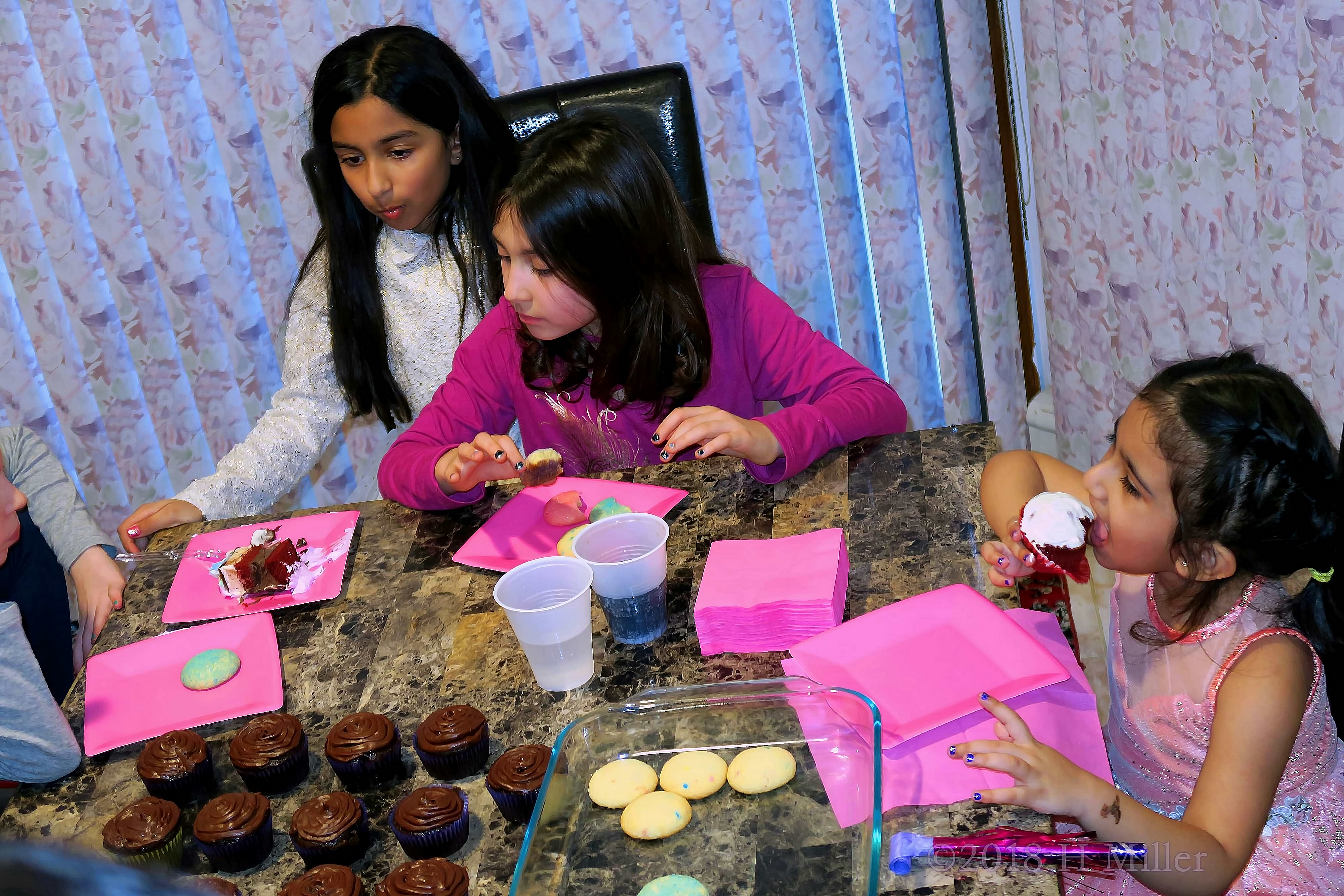 Guests Are Enjoying The Party Cake And Cupcakes Guests Are Enjoying The Party Cake And Cupcakes