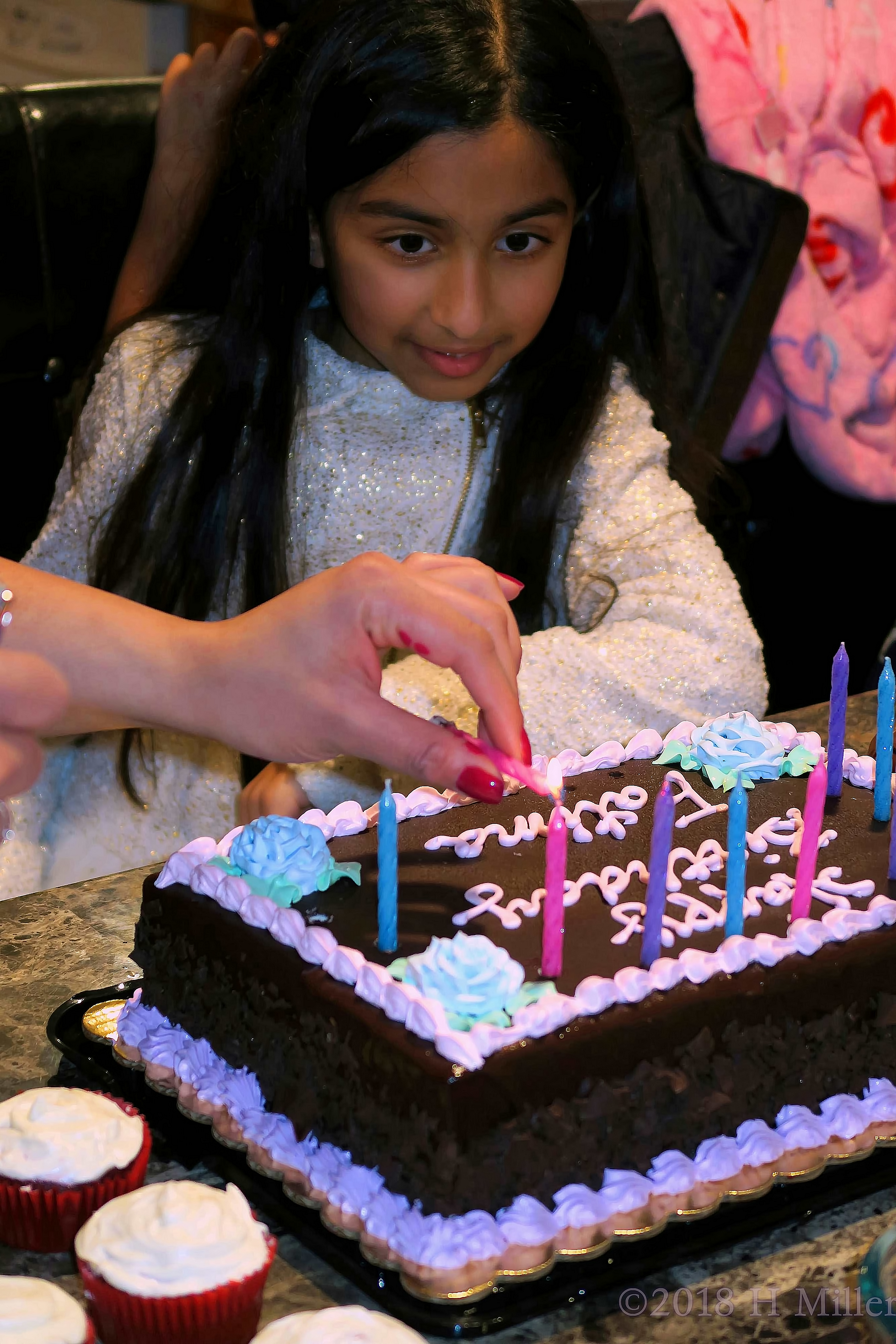 Lighting The Candles For The Birthday Party Lighting The Candles For The Birthday Party