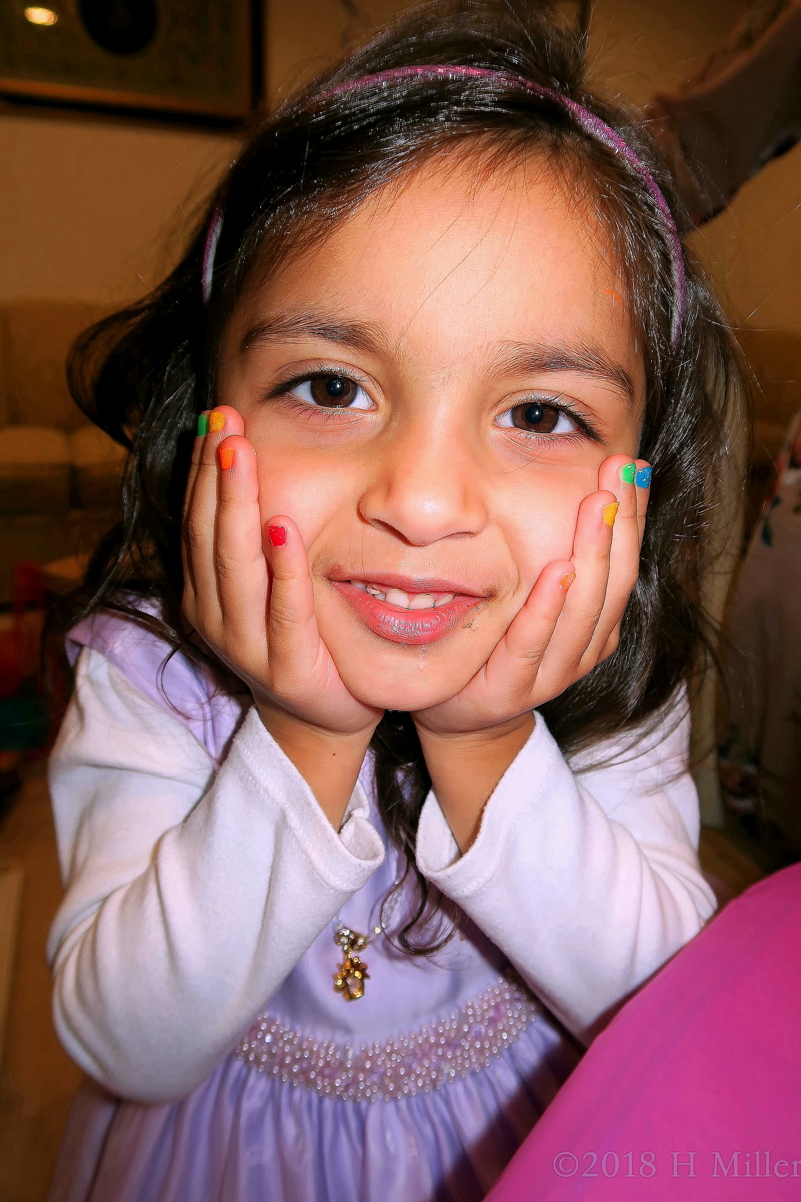 Showing Her Pretty Colorful Kids Manicure Showing Her Pretty Colorful Kids Manicure