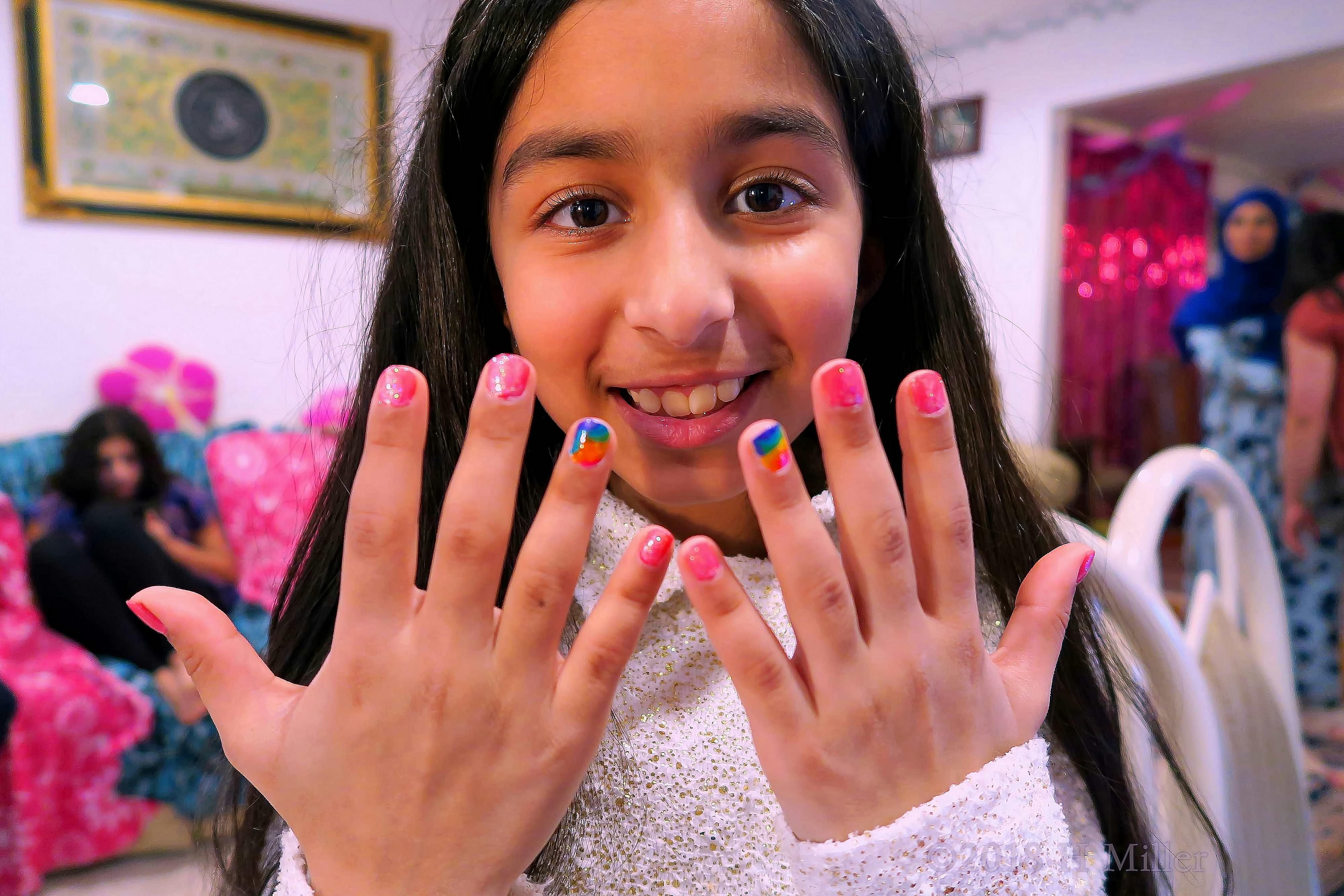 The Birthday Girl Is Showing Her New Mini Mani With A Smile 