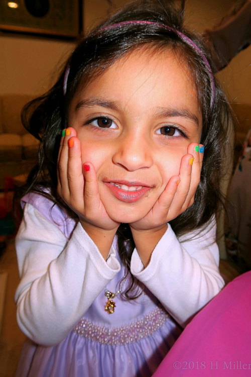 Showing Her Pretty Colorful Kids Manicure Showing Her Pretty Colorful Kids Manicure