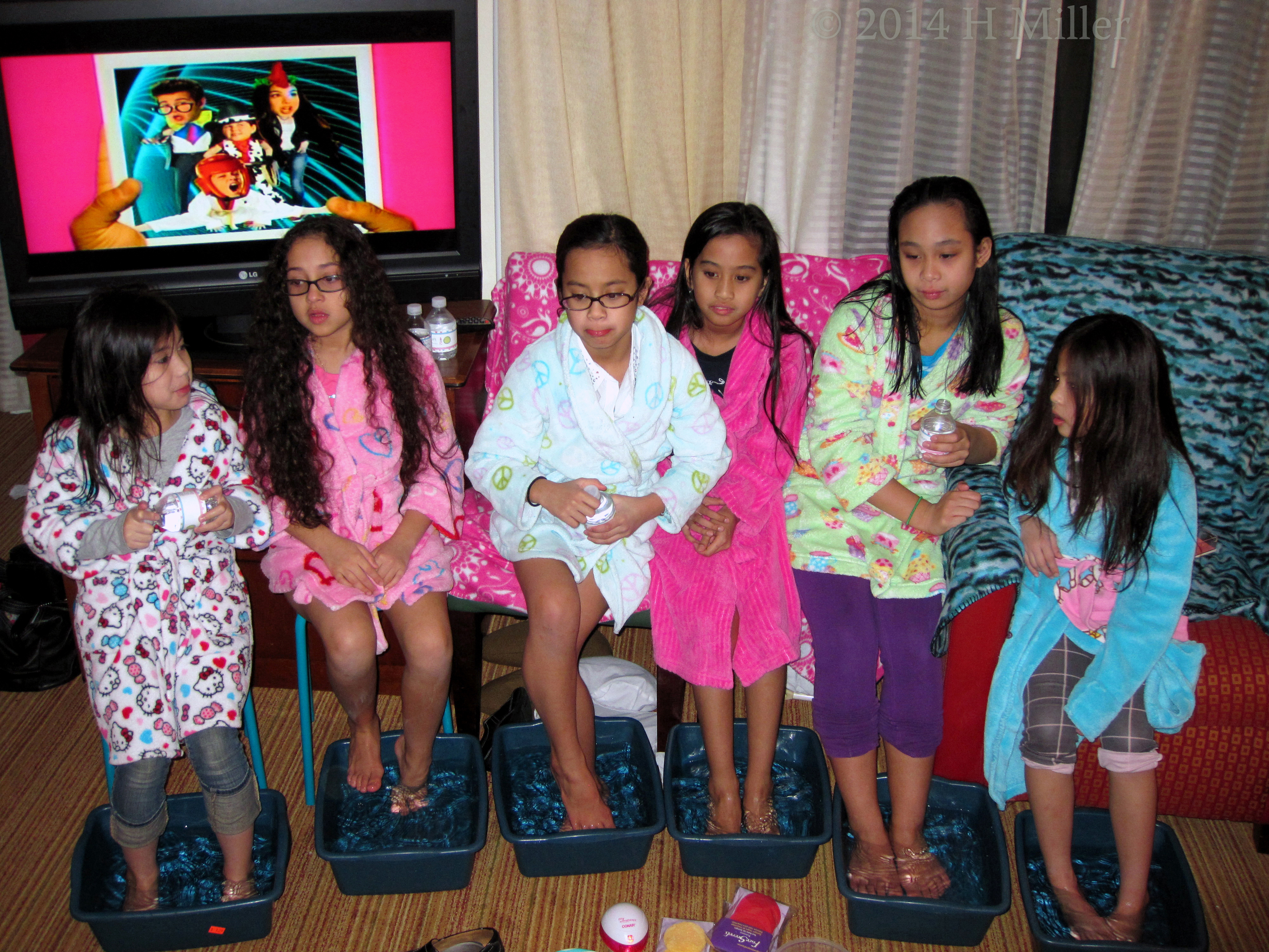 Hotel Spa Party Guests Relax With a Warm_Water Foot Soak 