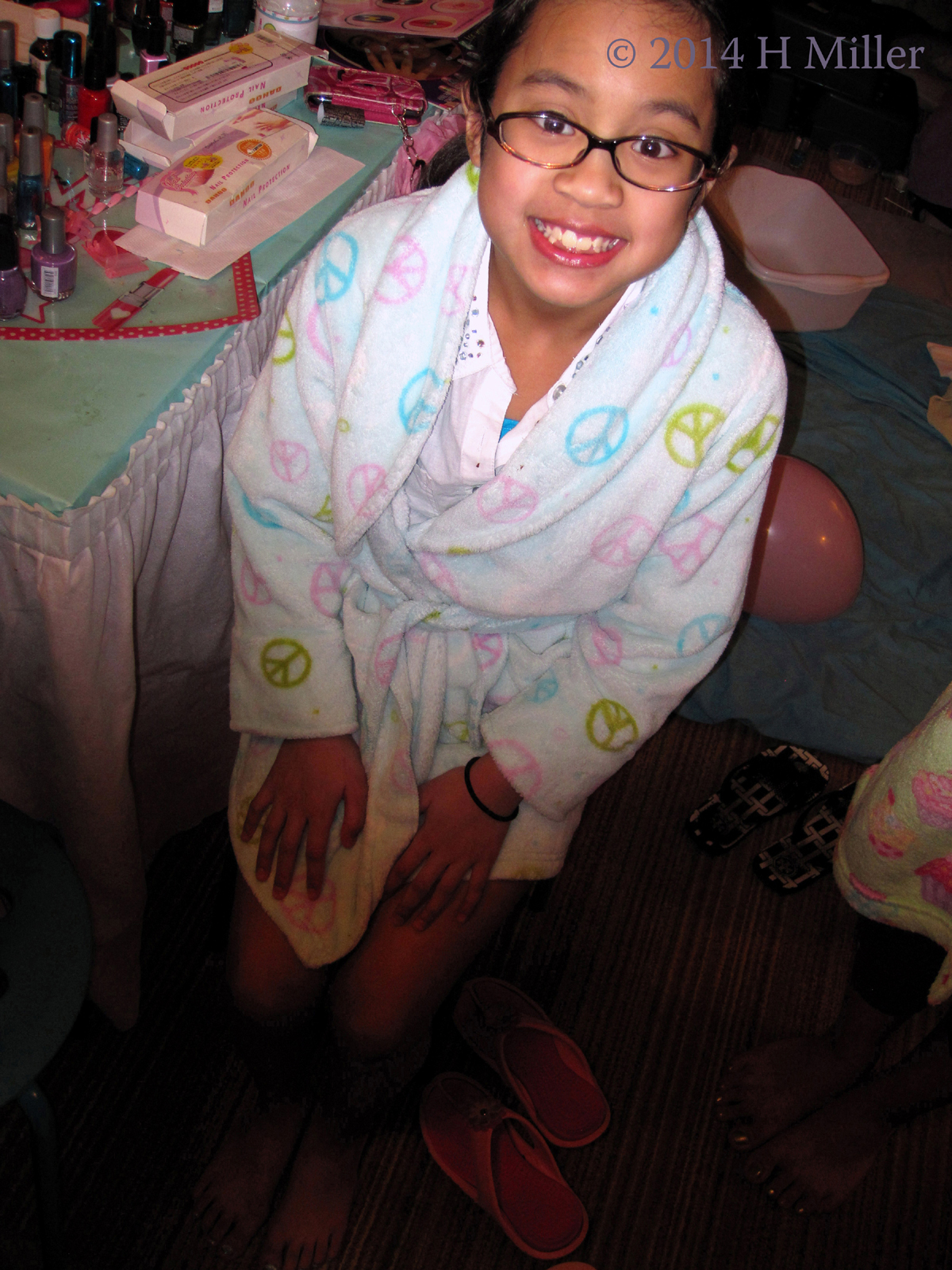 The Birthday Girl Smiling And Enjoying Her Party The Birthday Girl Smiling And Enjoying Her Party