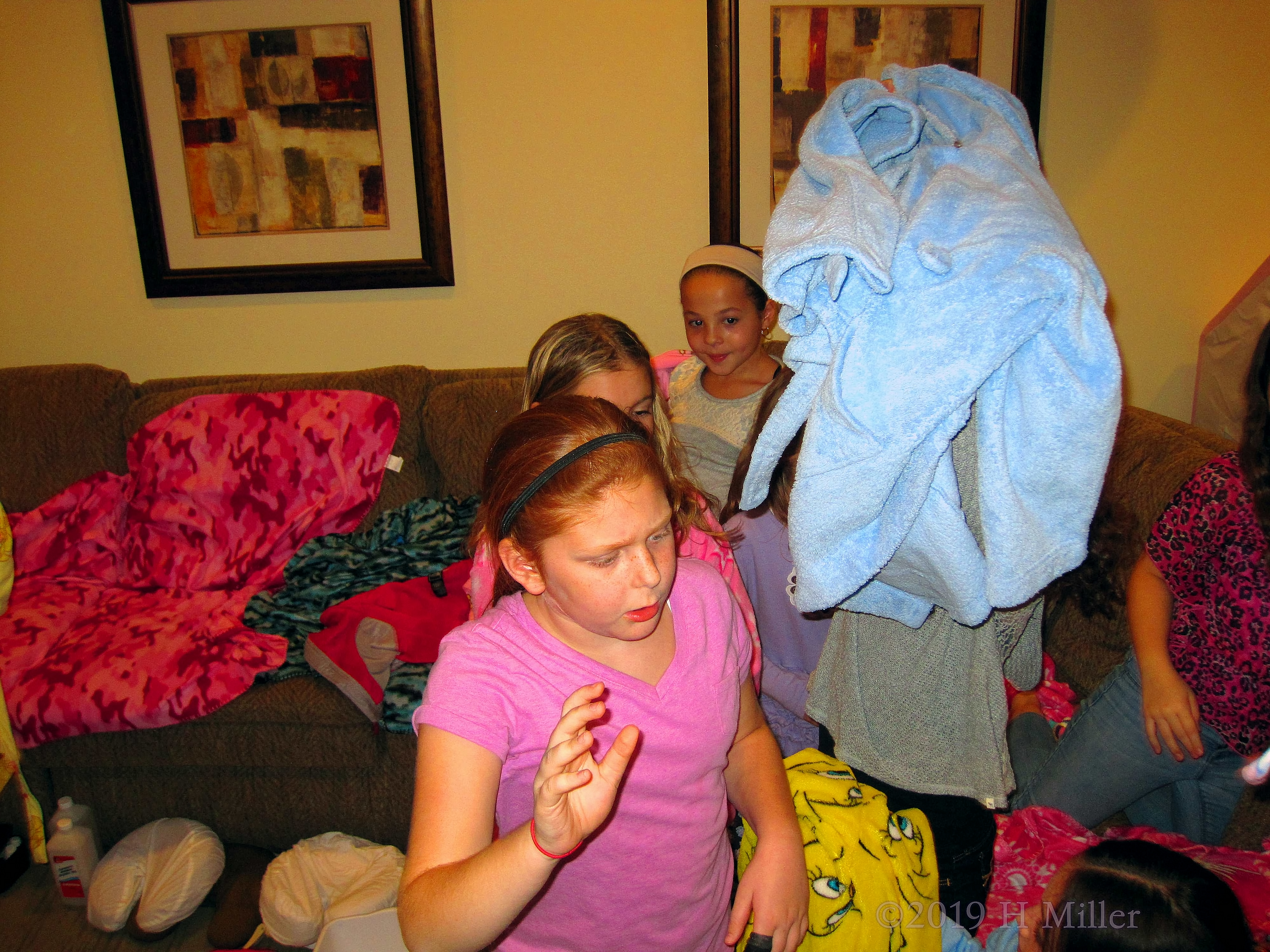 Candid Shot! Party Guests Putting On Their Spa Robes! 