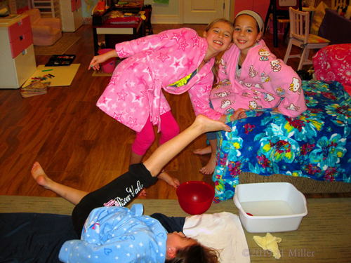 Posing And Pilates! Party Guest Lets Pedicure Airdry While Other Guests Pose!