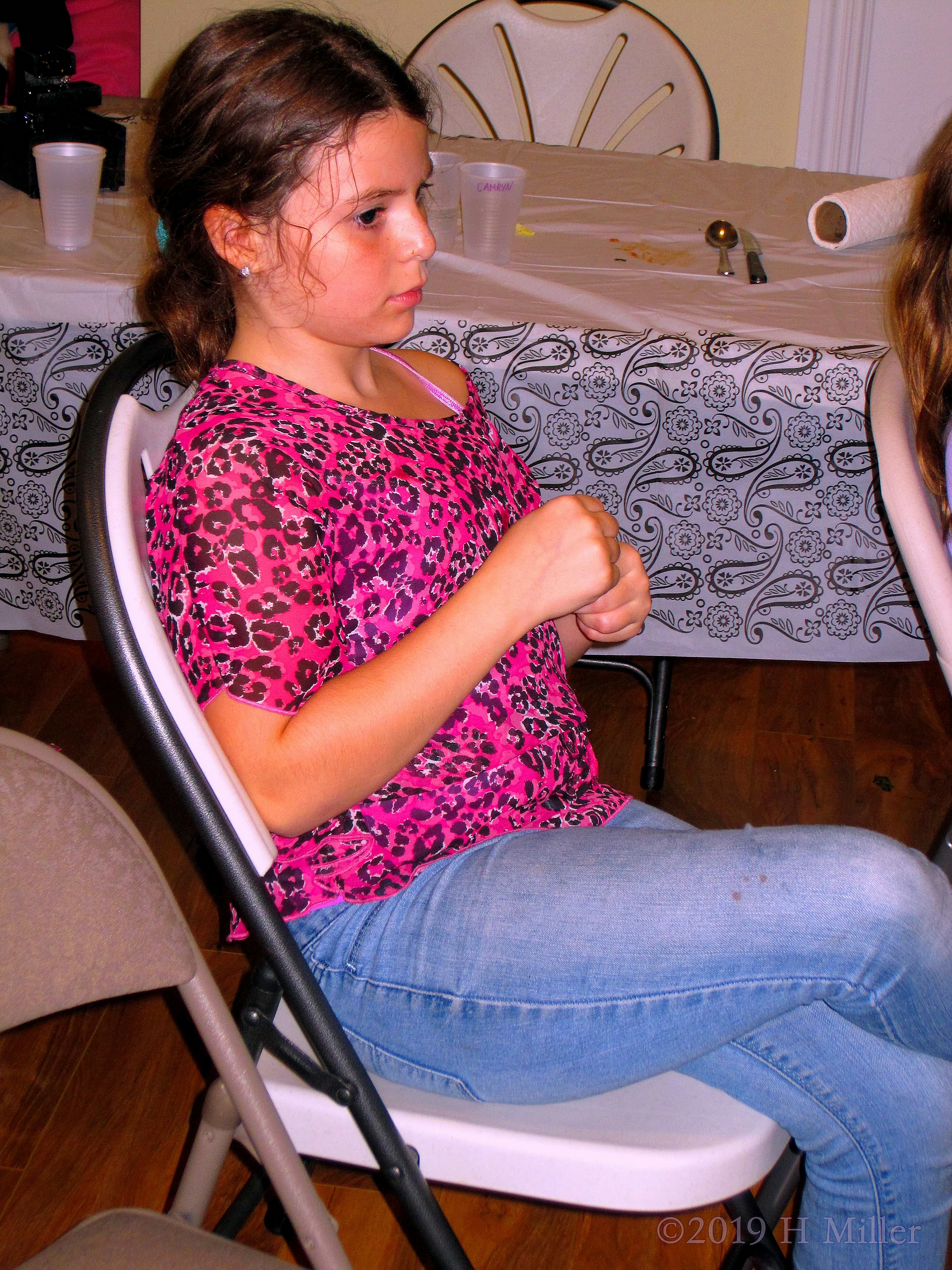 Posing In Pink! Party Guest Sits Patiently Working On Her Craft For Kids! 