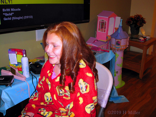 Party Guest Gets Beautiful Curls Kids Hairstyle At The Hair Salon Station At The Spa Party