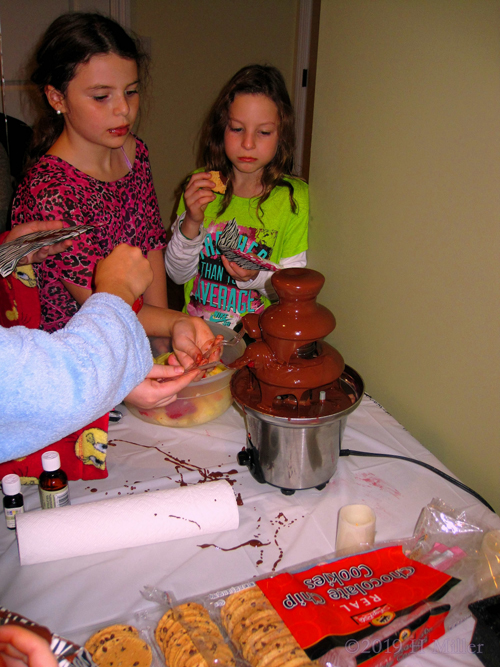 The Best Fountains Are Made Of Chocolate! Party Guests Try The Chocolate Fountain