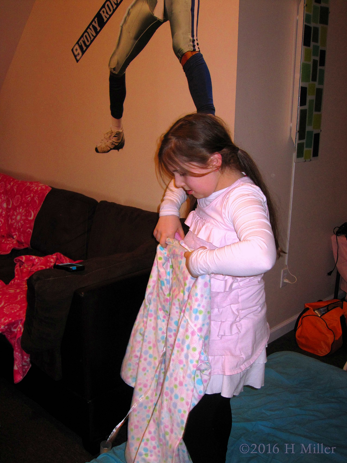 Putting On A Kids Spa Robe 
