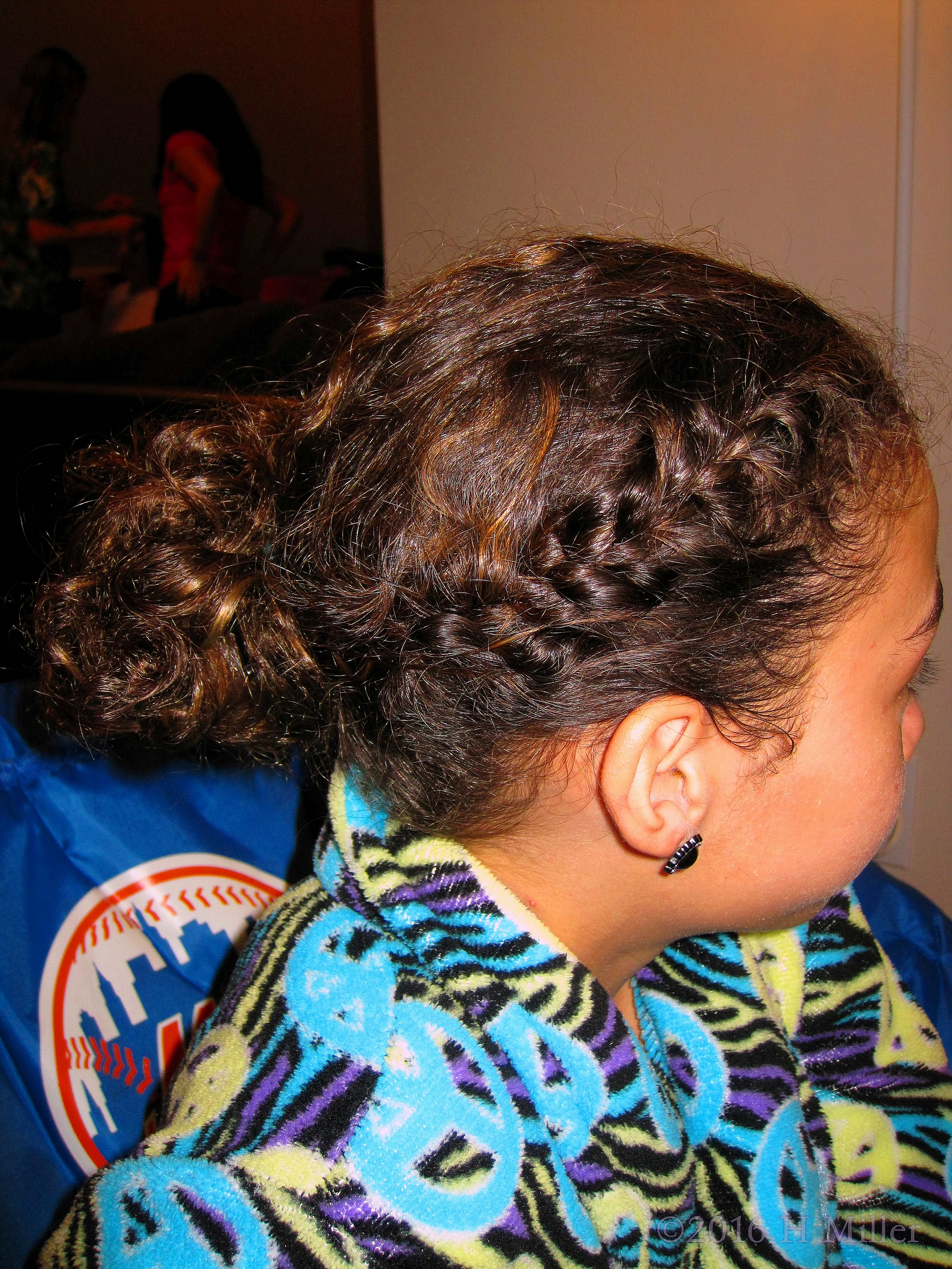 Cool Hairstyle With Braids And A Bun! 